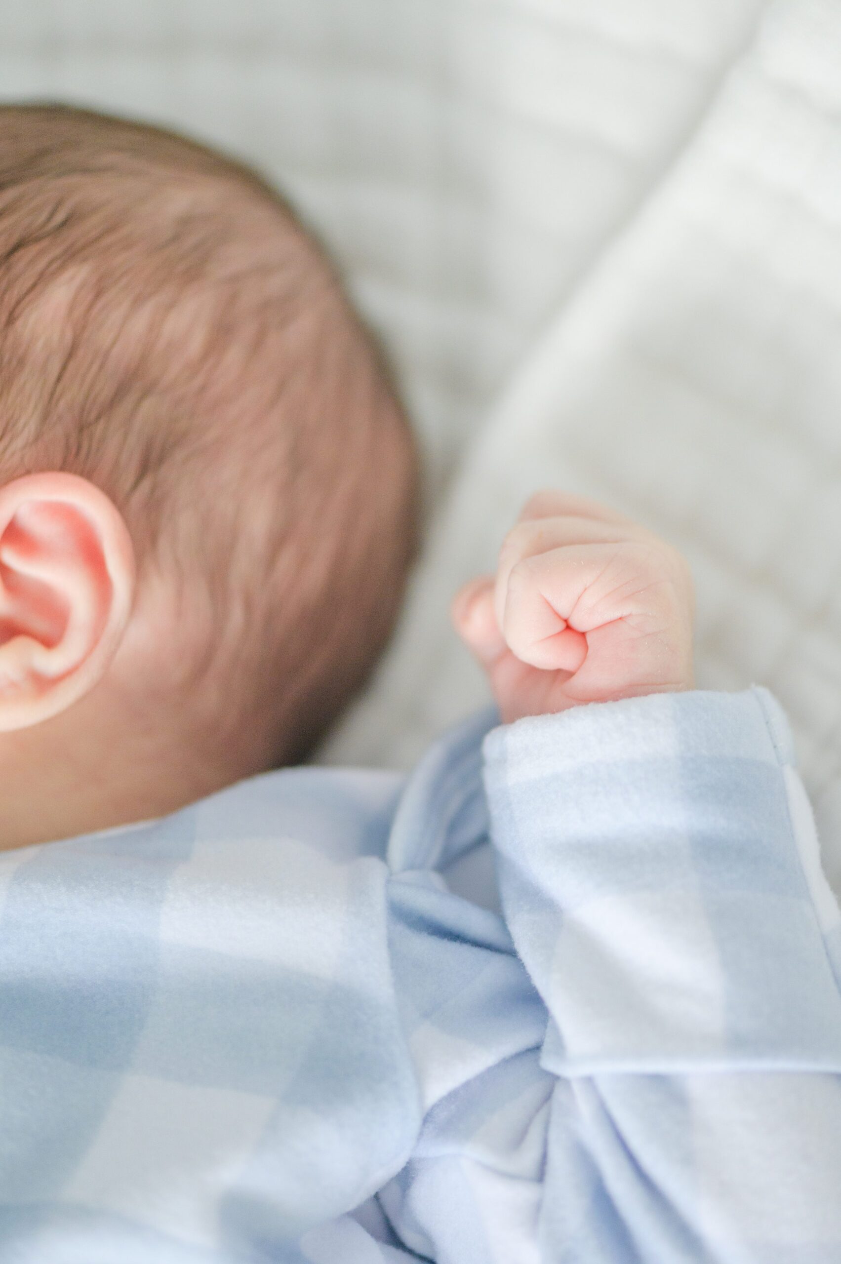 In-home Philly lifestyle newborn portrait session photographed by Cait Kramer