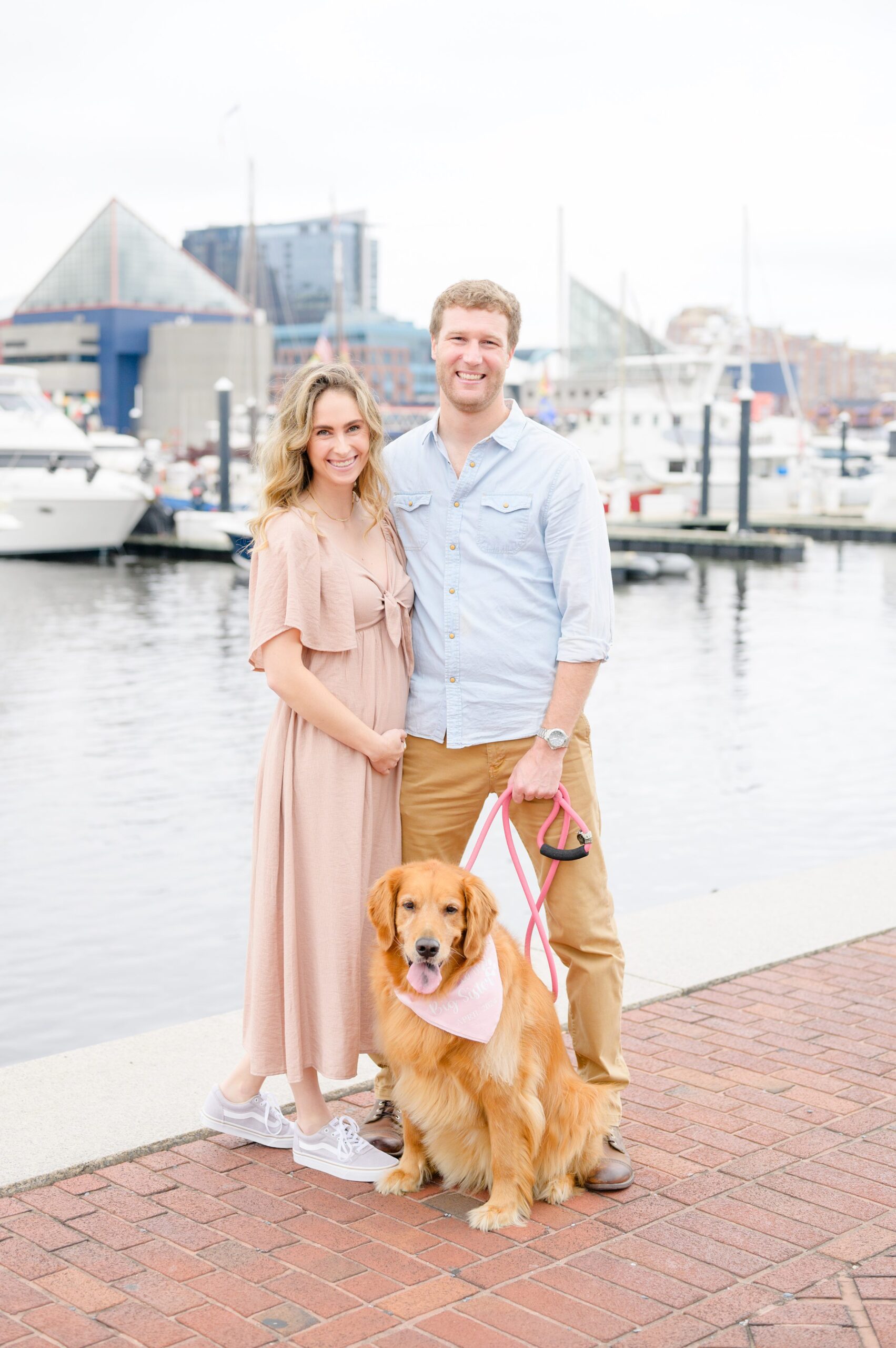 Pregnancy announcement photos at the Baltimore Inner Harbor photographed by Baltimore Maternity Photographer Cait Kramer.