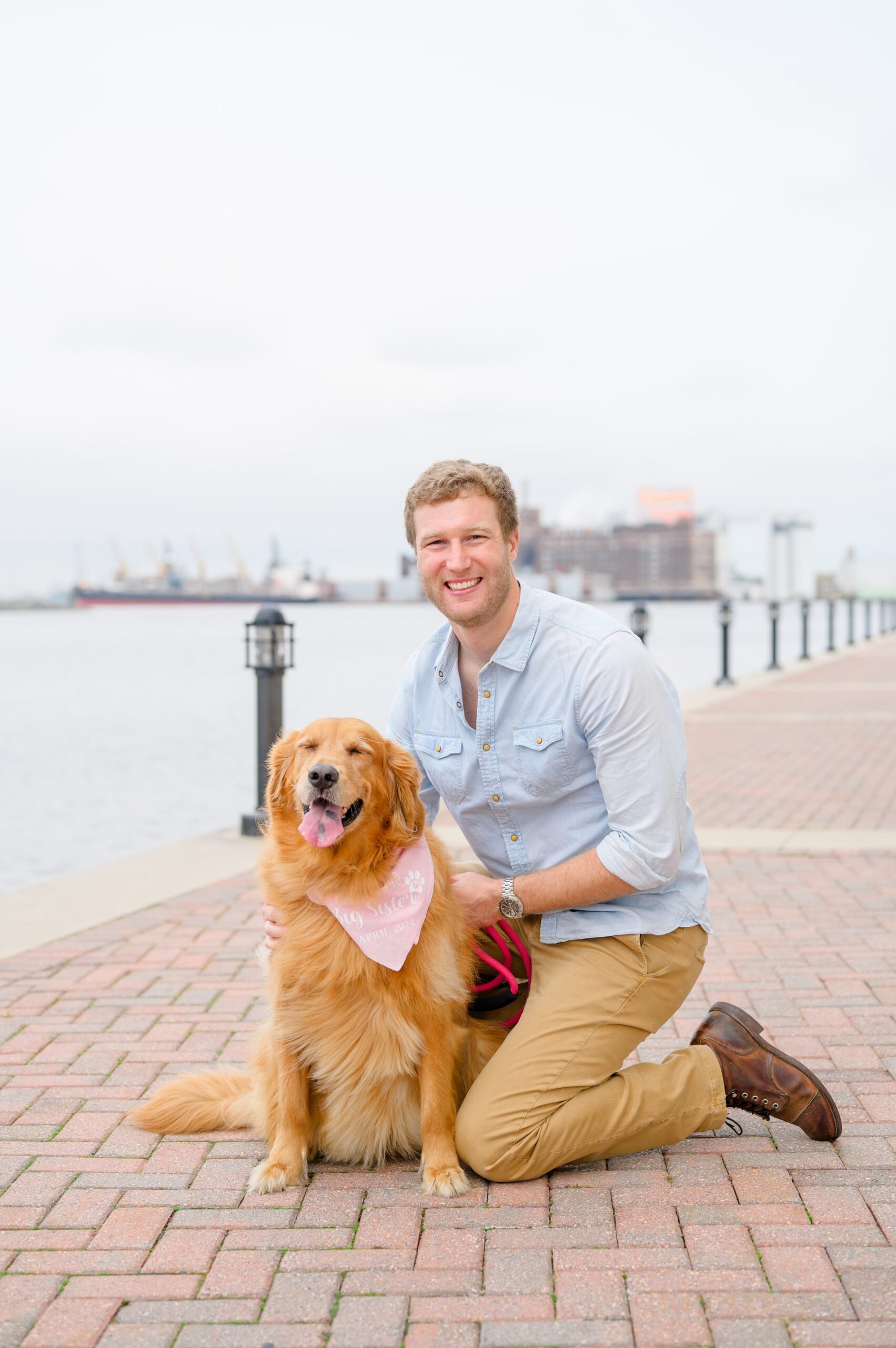 Pregnancy announcement photos at the Baltimore Inner Harbor photographed by Baltimore Maternity Photographer Cait Kramer.