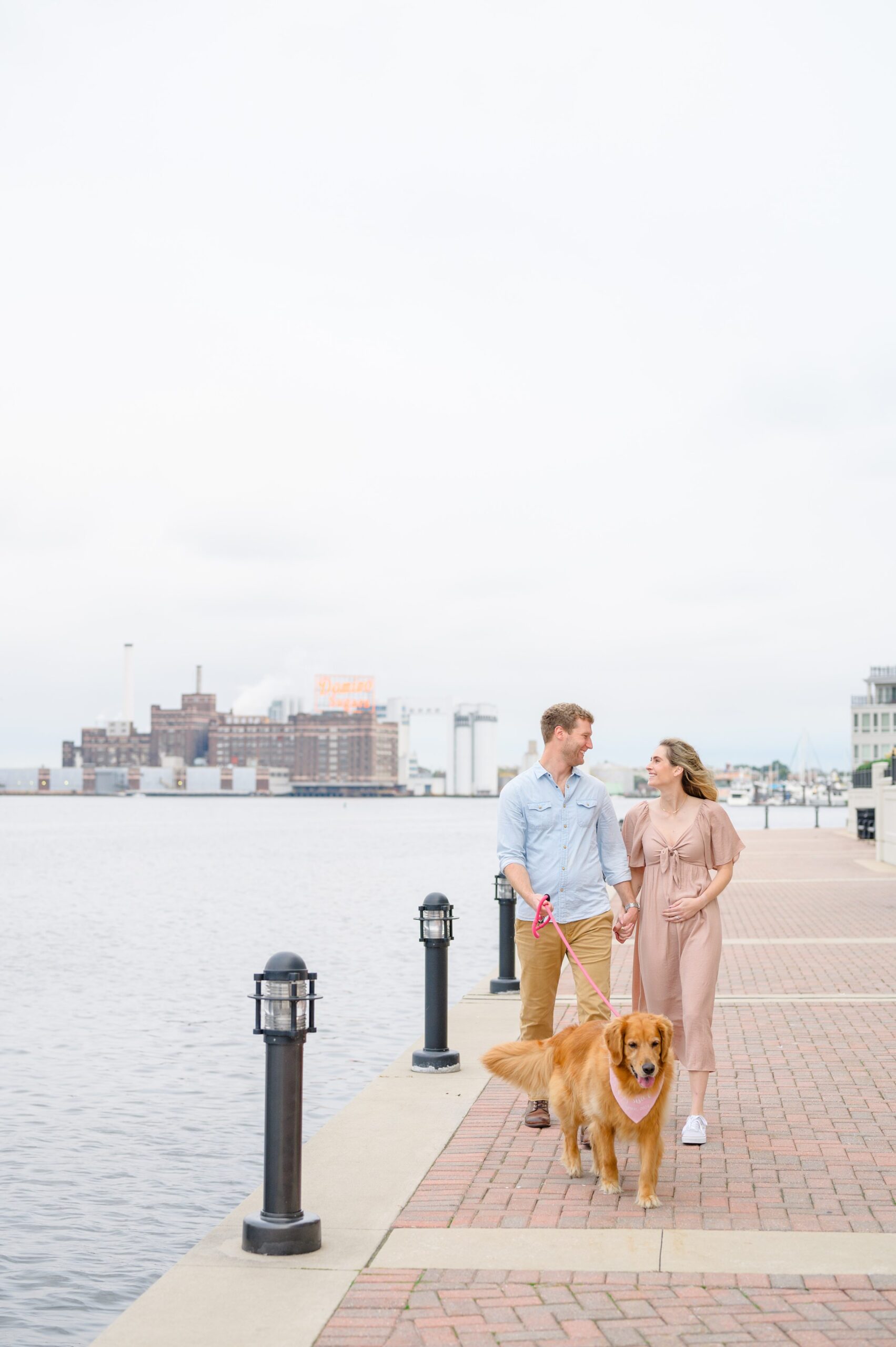 Pregnancy announcement photos at the Baltimore Inner Harbor photographed by Baltimore Maternity Photographer Cait Kramer.