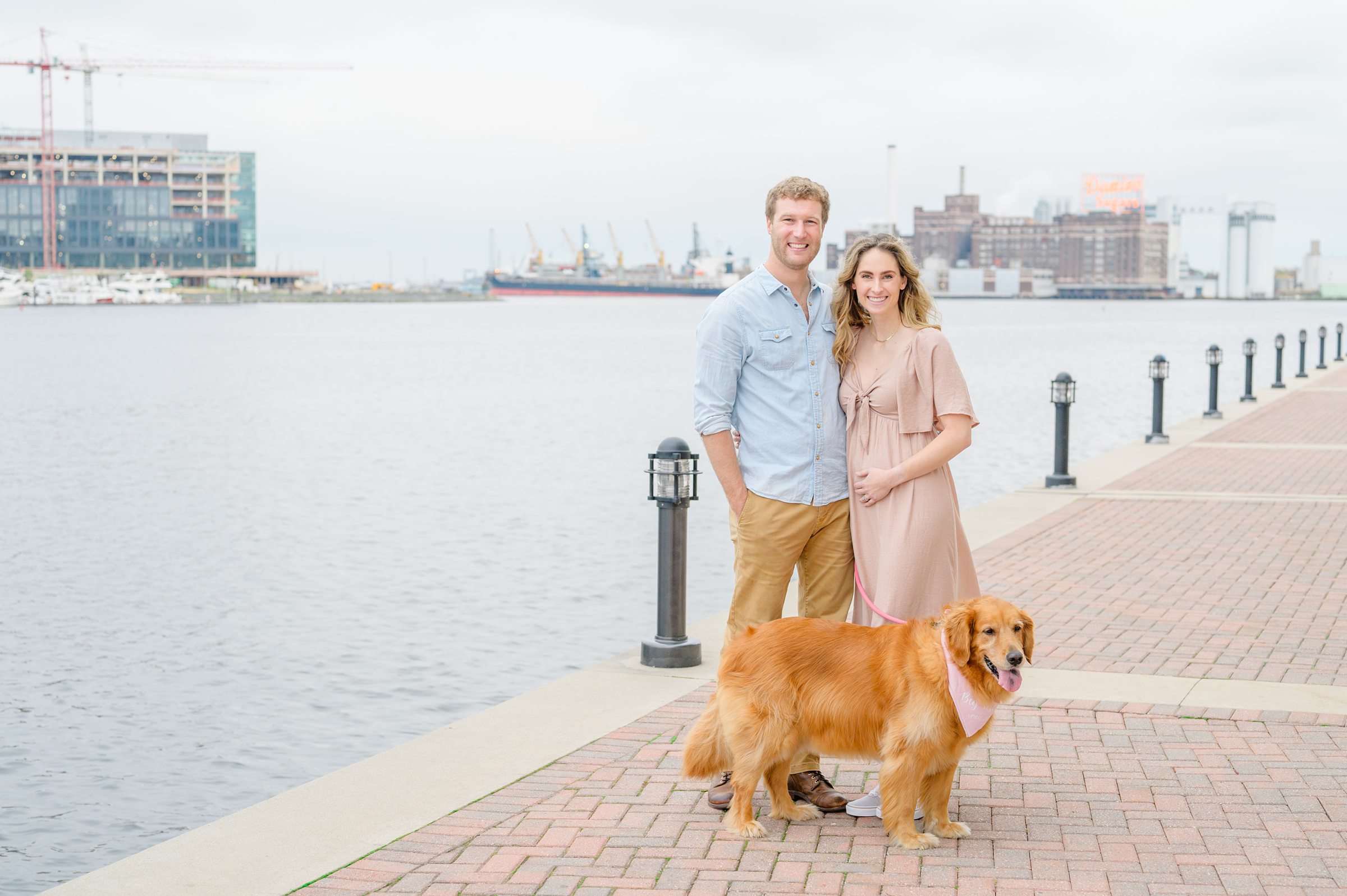 Pregnancy announcement photos at the Baltimore Inner Harbor photographed by Baltimore Maternity Photographer Cait Kramer.