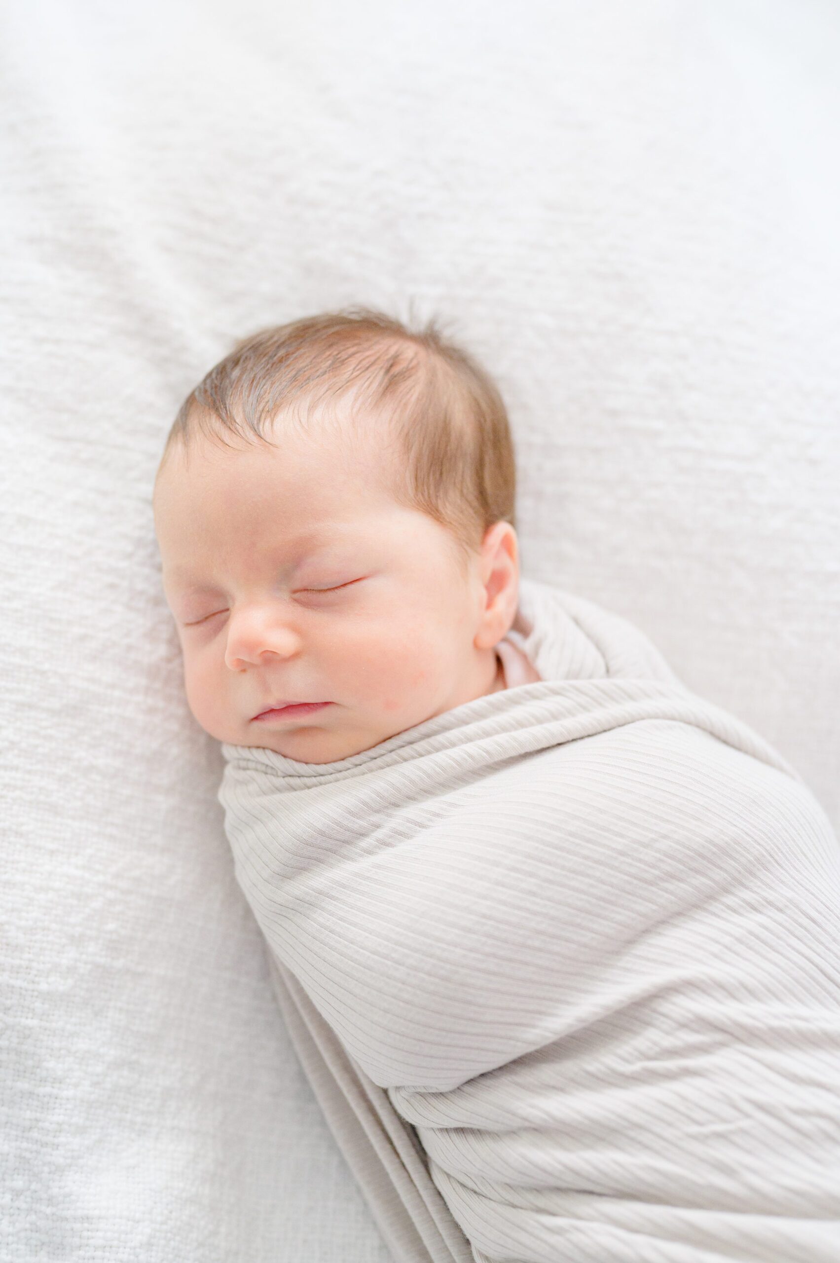 In-home newborn photography session photographed by Newborn Photographer in Baltimore, Maryland Cait Kramer.