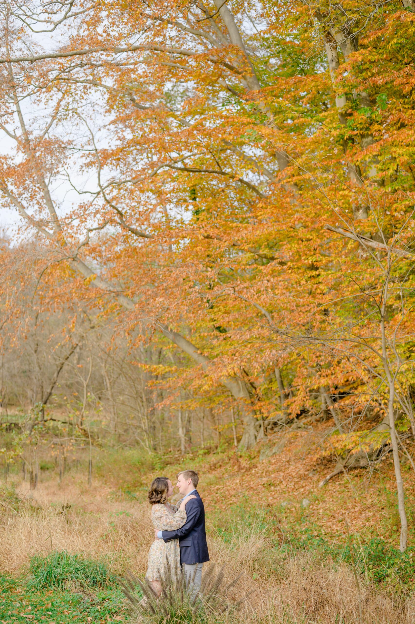 Engaged couple at the Historic Old Ellicott City near Baltimore, Maryland for engagement photos photographed by Baltimore Wedding Photographer Cait Kramer Photography