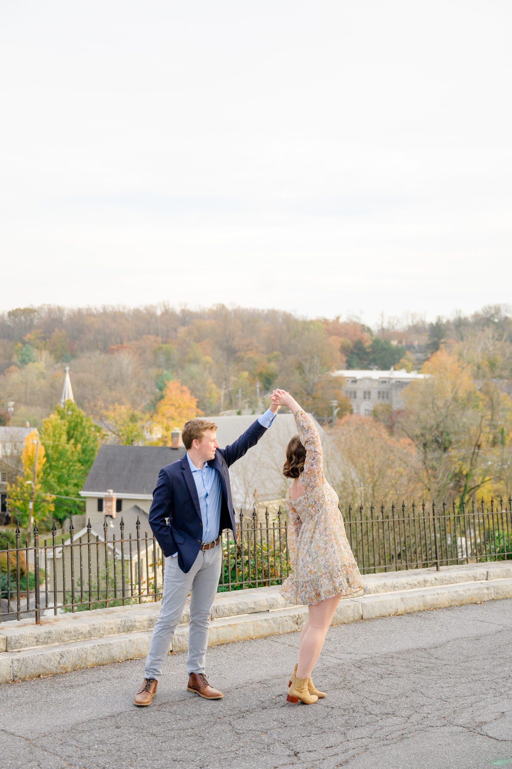 Engaged couple at the Historic Old Ellicott City near Baltimore, Maryland for engagement photos photographed by Baltimore Wedding Photographer Cait Kramer Photography