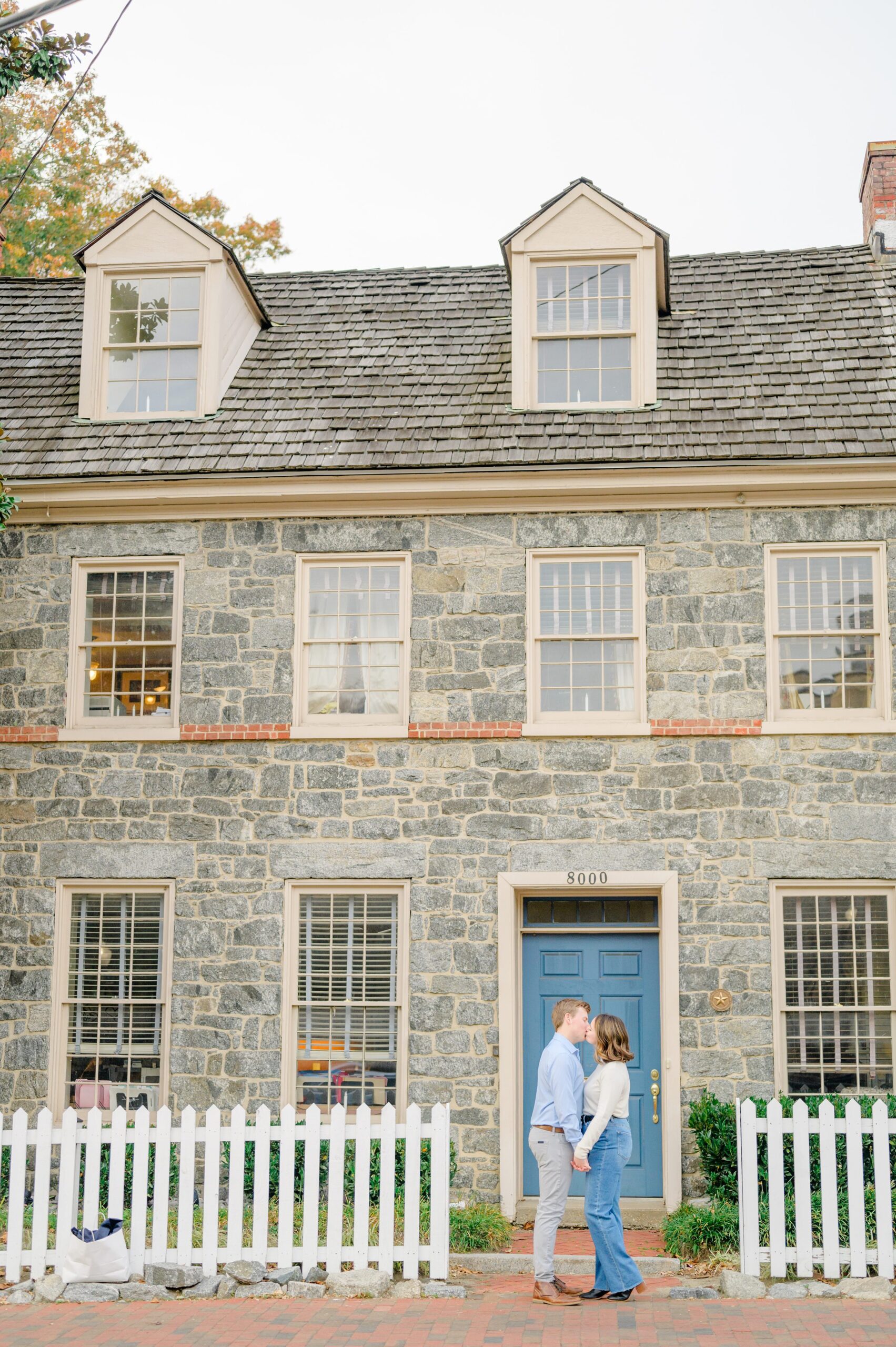 Engaged couple at the Historic Old Ellicott City near Baltimore, Maryland for engagement photos photographed by Baltimore Wedding Photographer Cait Kramer Photography