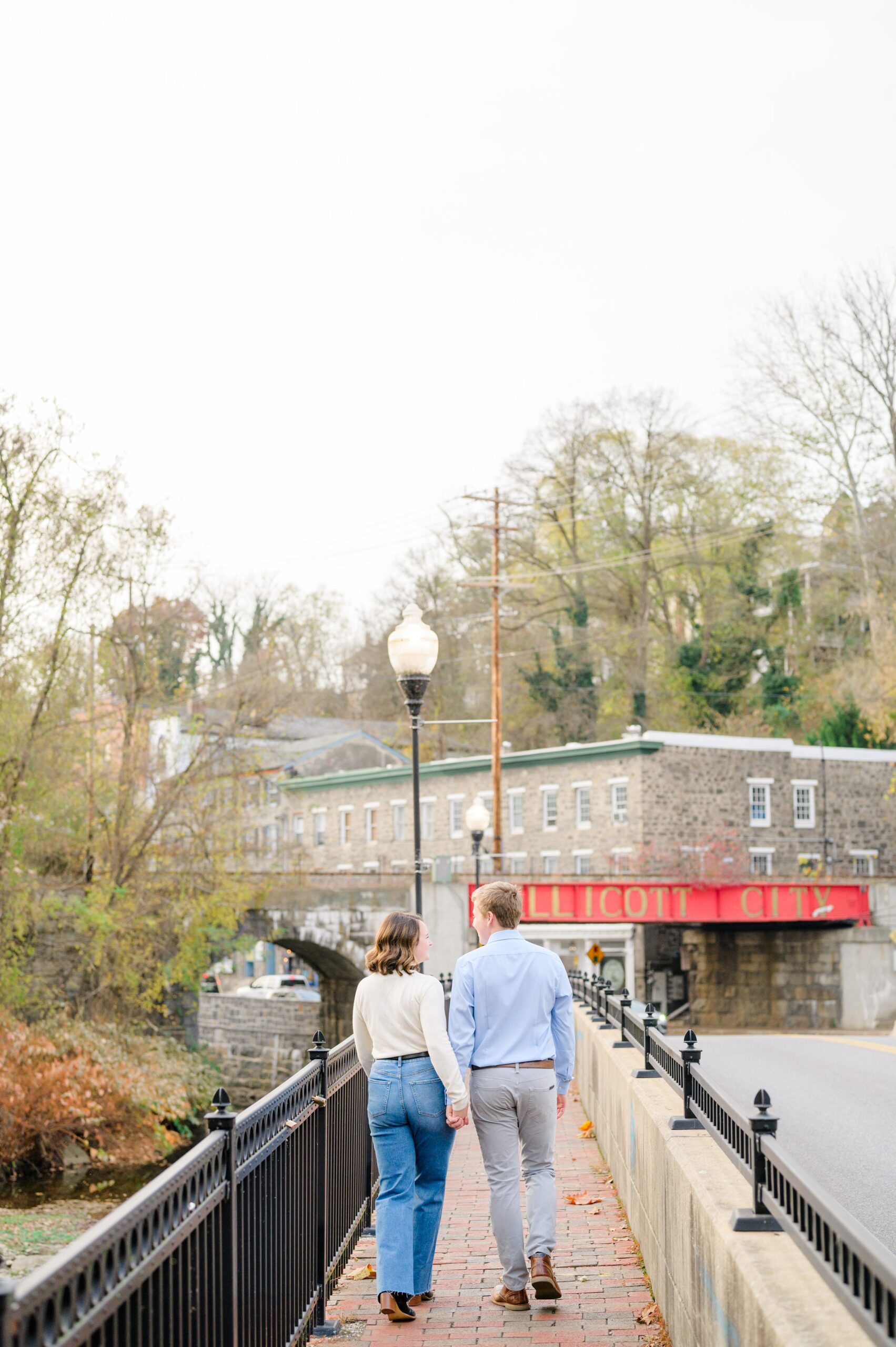 Engaged couple at the Historic Old Ellicott City near Baltimore, Maryland for engagement photos photographed by Baltimore Wedding Photographer Cait Kramer Photography