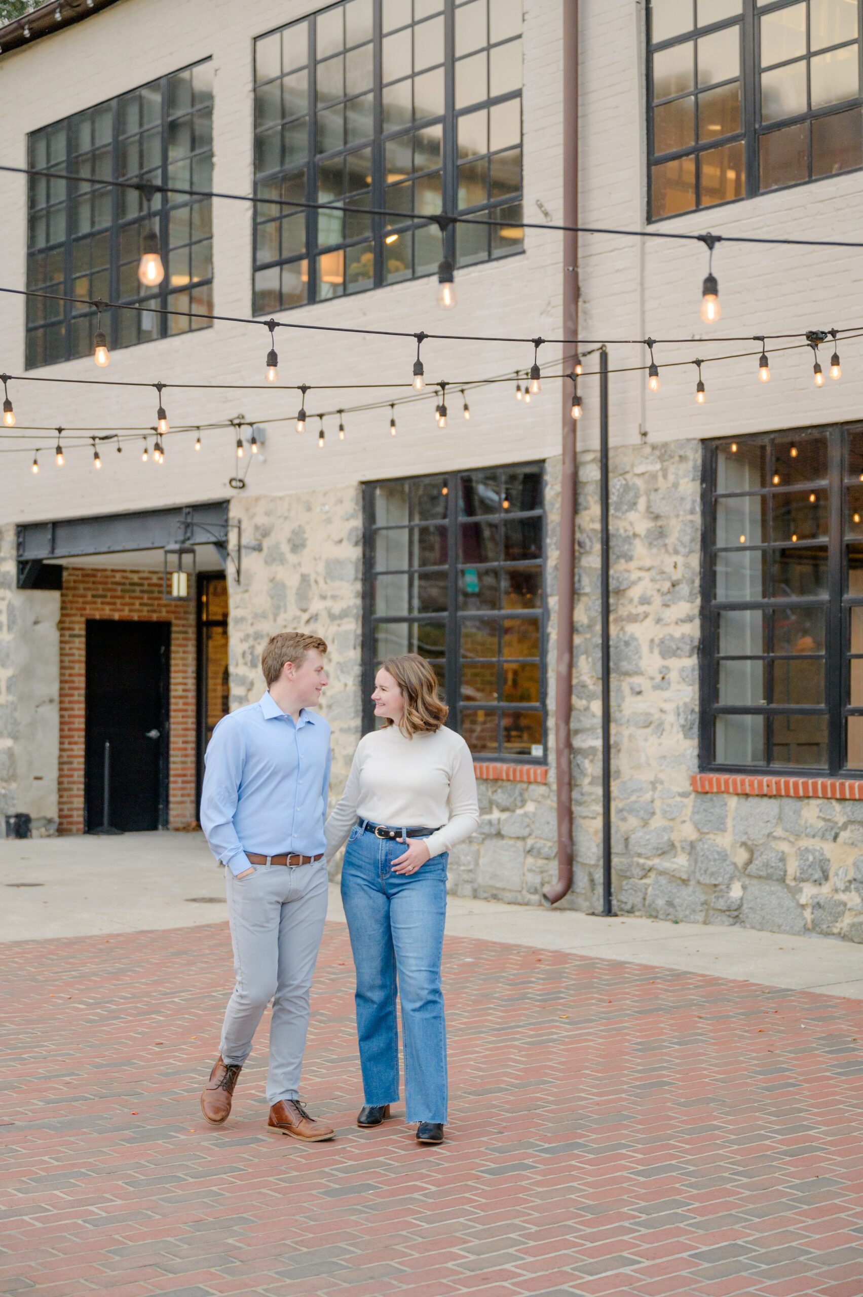 Engaged couple at the Historic Old Ellicott City near Baltimore, Maryland for engagement photos photographed by Baltimore Wedding Photographer Cait Kramer Photography