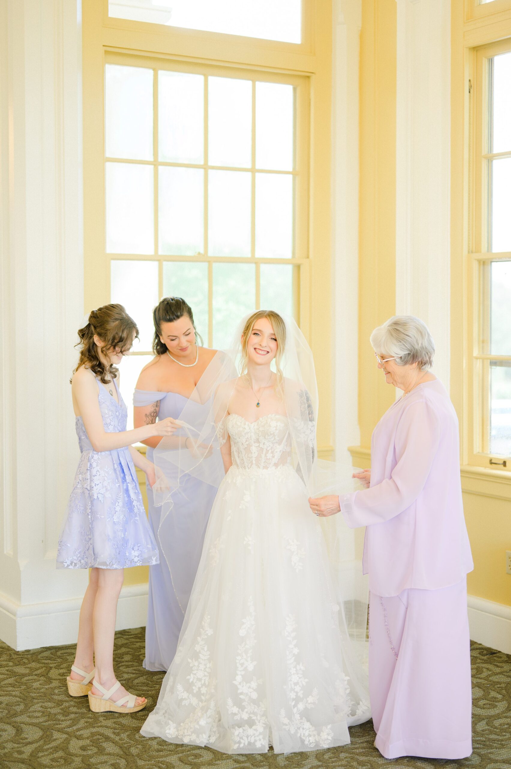 Bride getting ready at Maryland Zoo Wedding in Baltimore, Maryland photographed by Baltimore Wedding Photographer Cait Kramer
