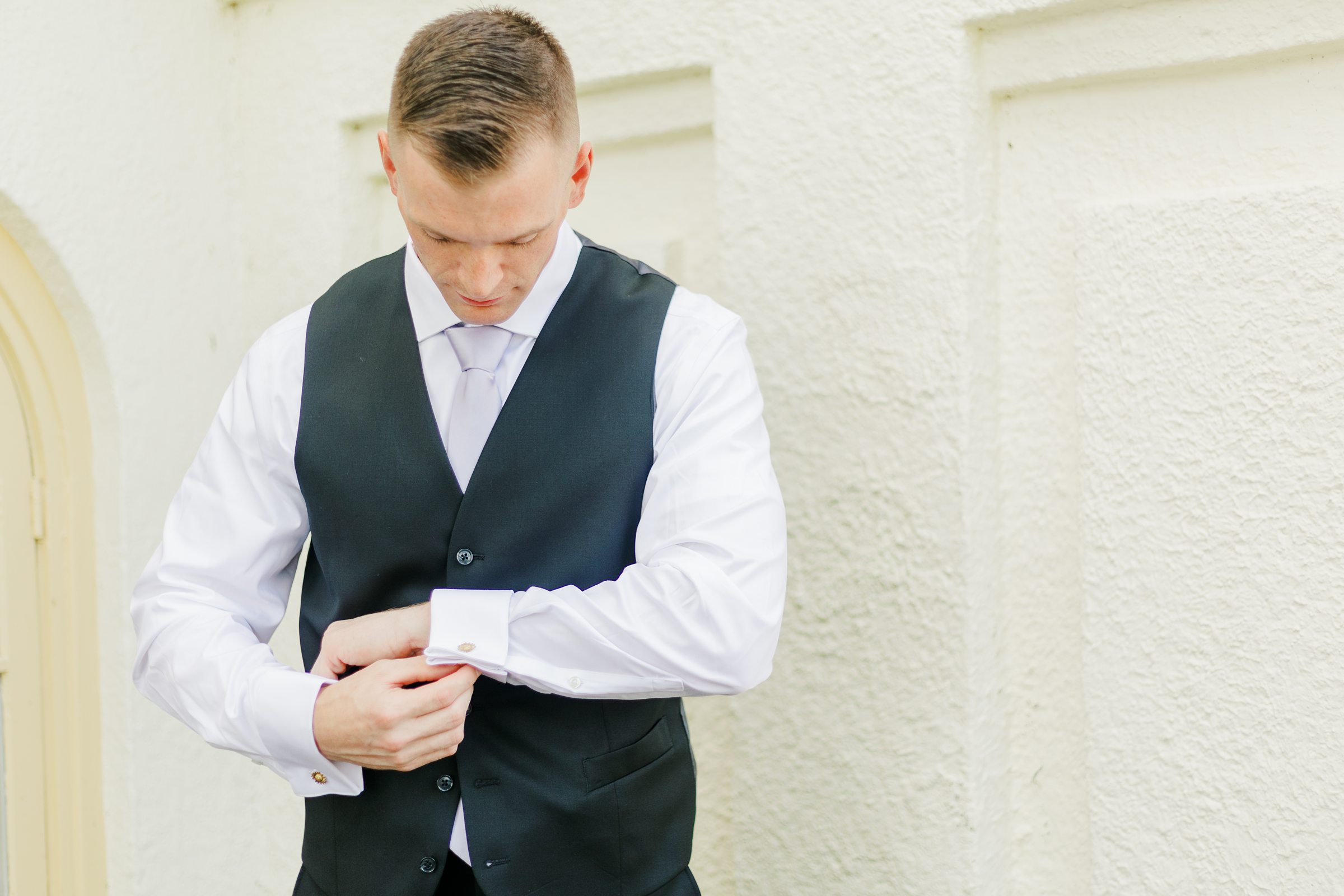 Groom getting ready at Maryland Zoo Wedding in Baltimore, Maryland photographed by Baltimore Wedding Photographer Cait Kramer