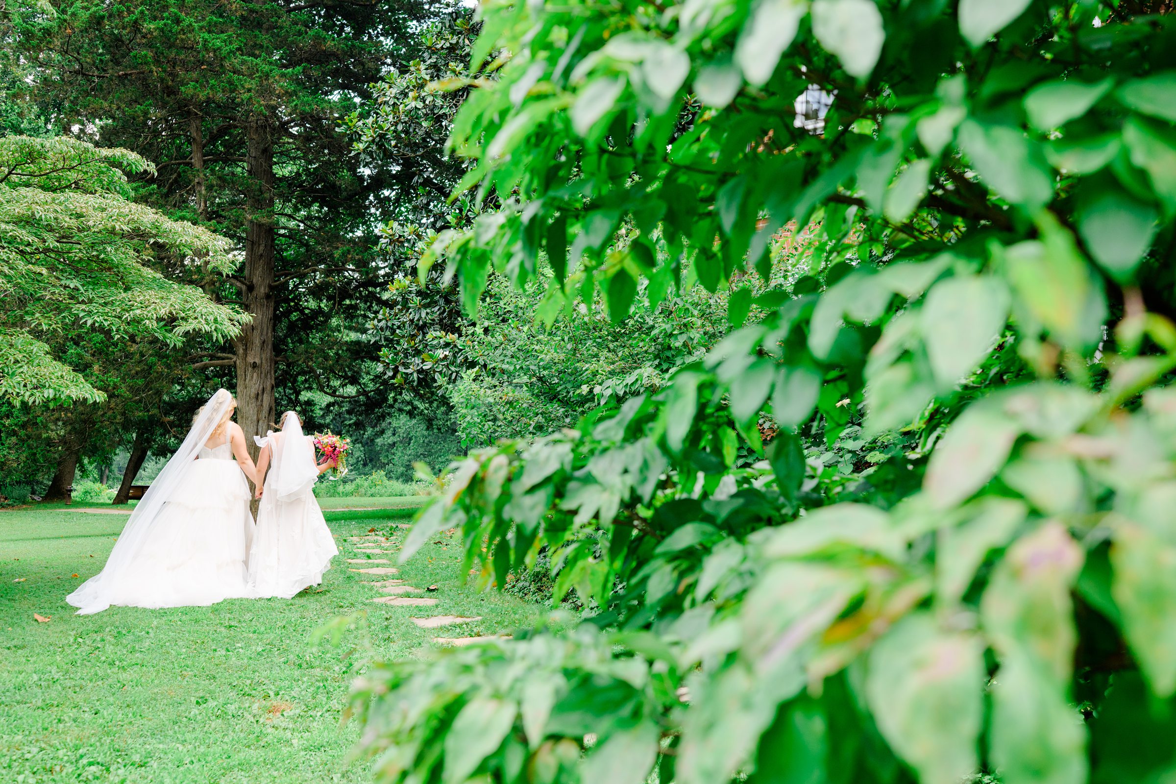 Kara and Kendall's vibrant summer wedding at the Woodend Nature Sanctuary photographed by Baltimore Wedding Photographer Cait Kramer.