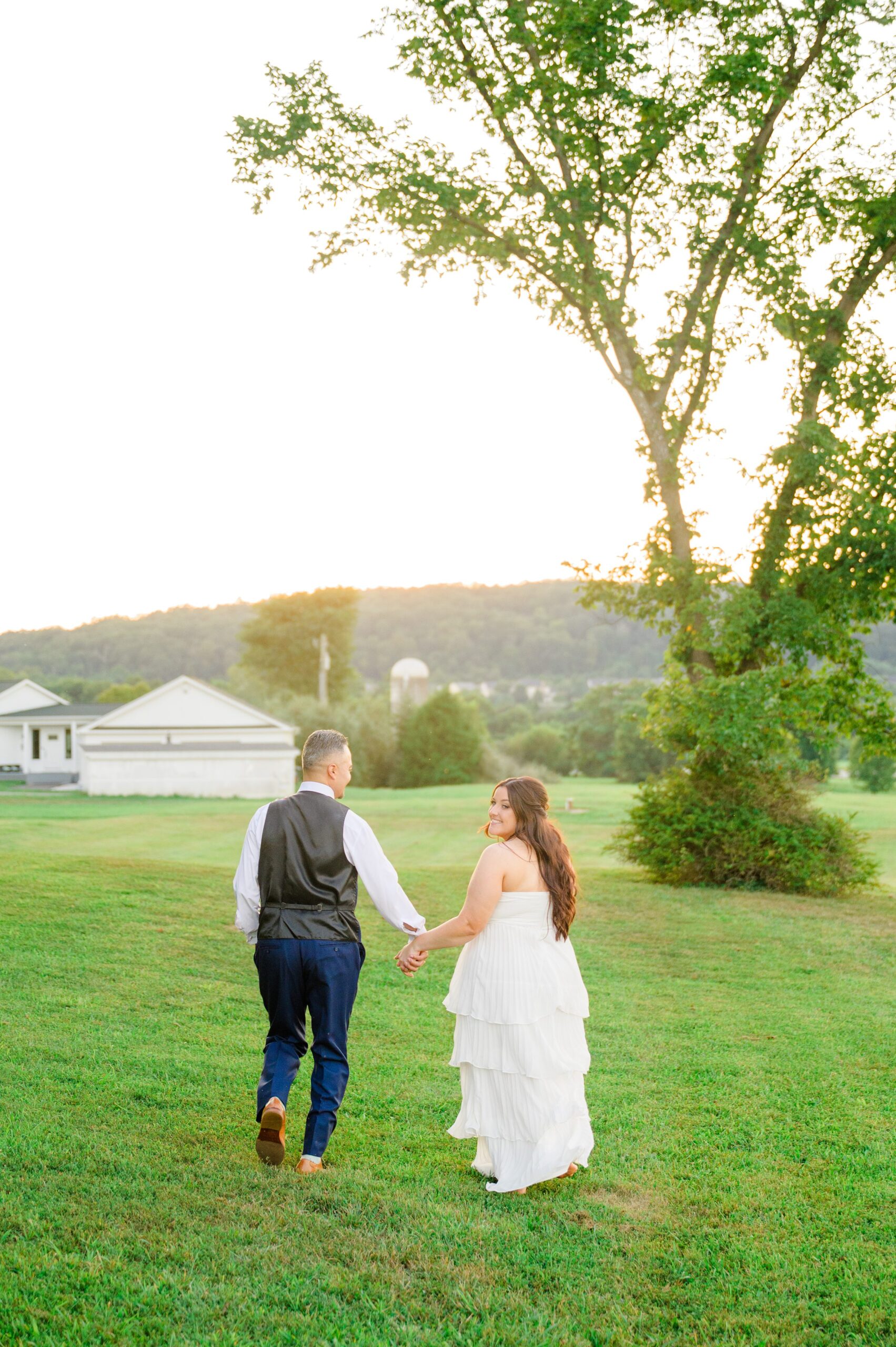 Summer wedding day at Raspberry Plain Manor in Leesburg, Virginia. Photographed by Baltimore Wedding Photographer Cait Kramer.