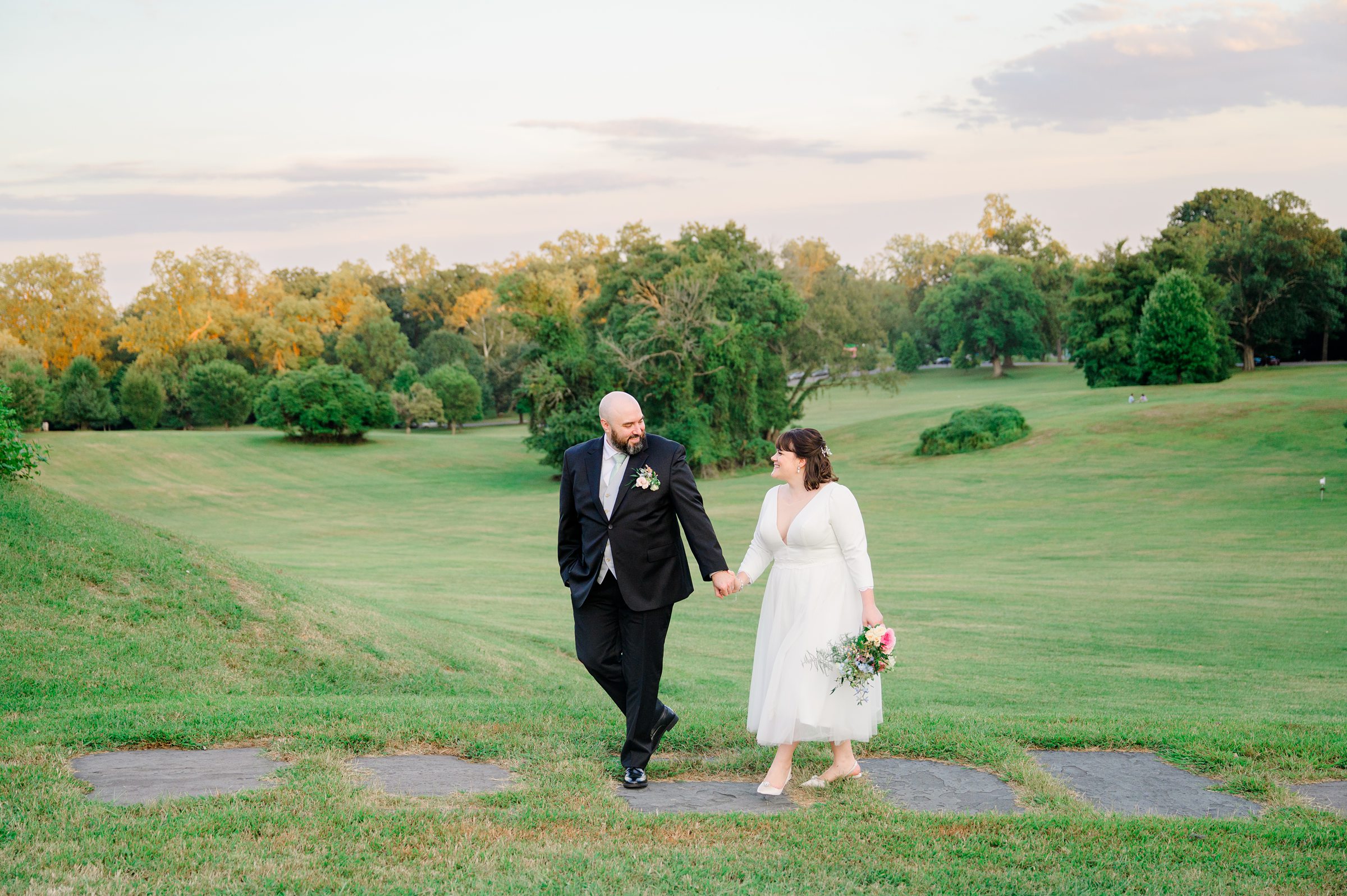 Golden hour newlywed portraits at the Maryland Zoo photographed by Baltimore Wedding Photographer Cait Kramer.