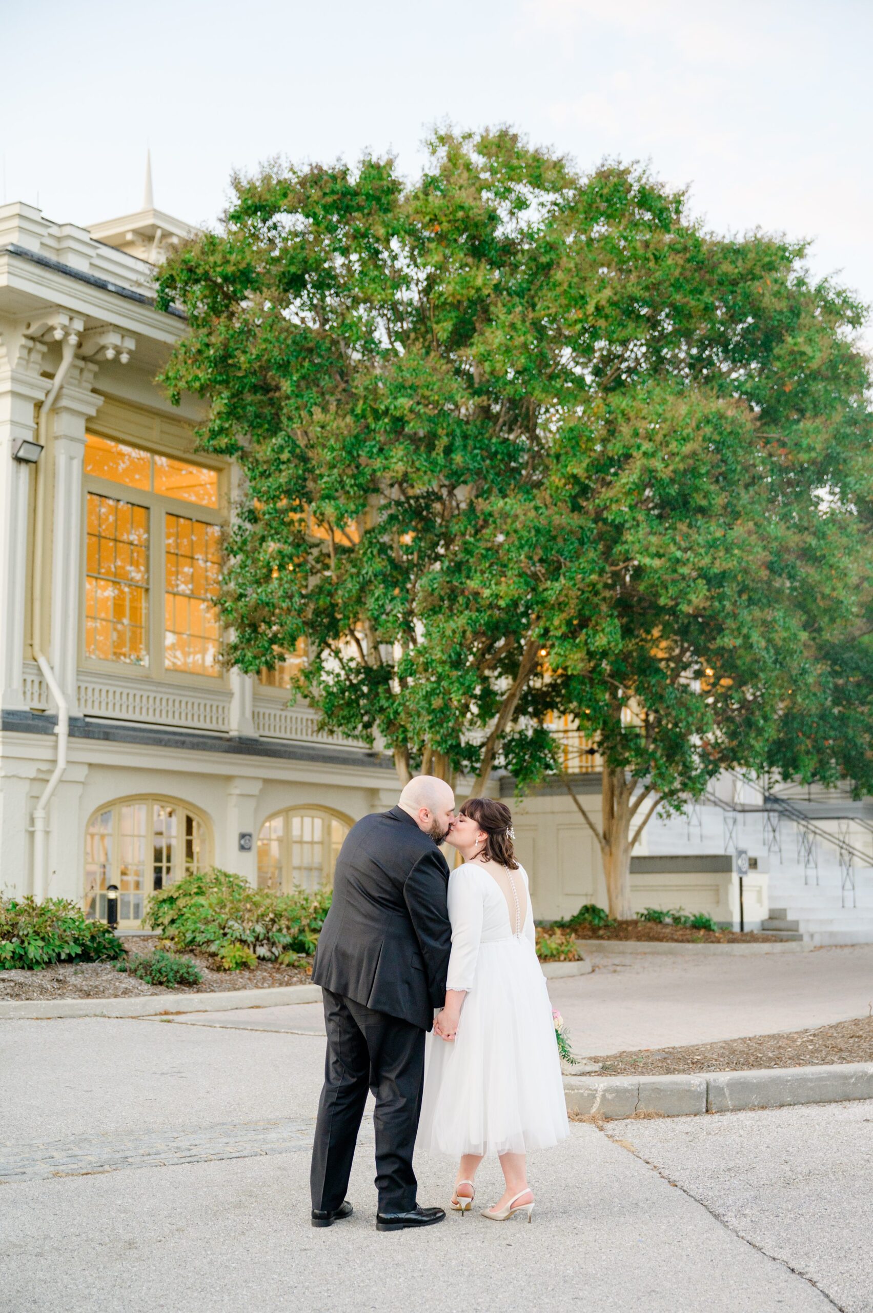 Golden hour newlywed portraits at the Maryland Zoo photographed by Baltimore Wedding Photographer Cait Kramer.