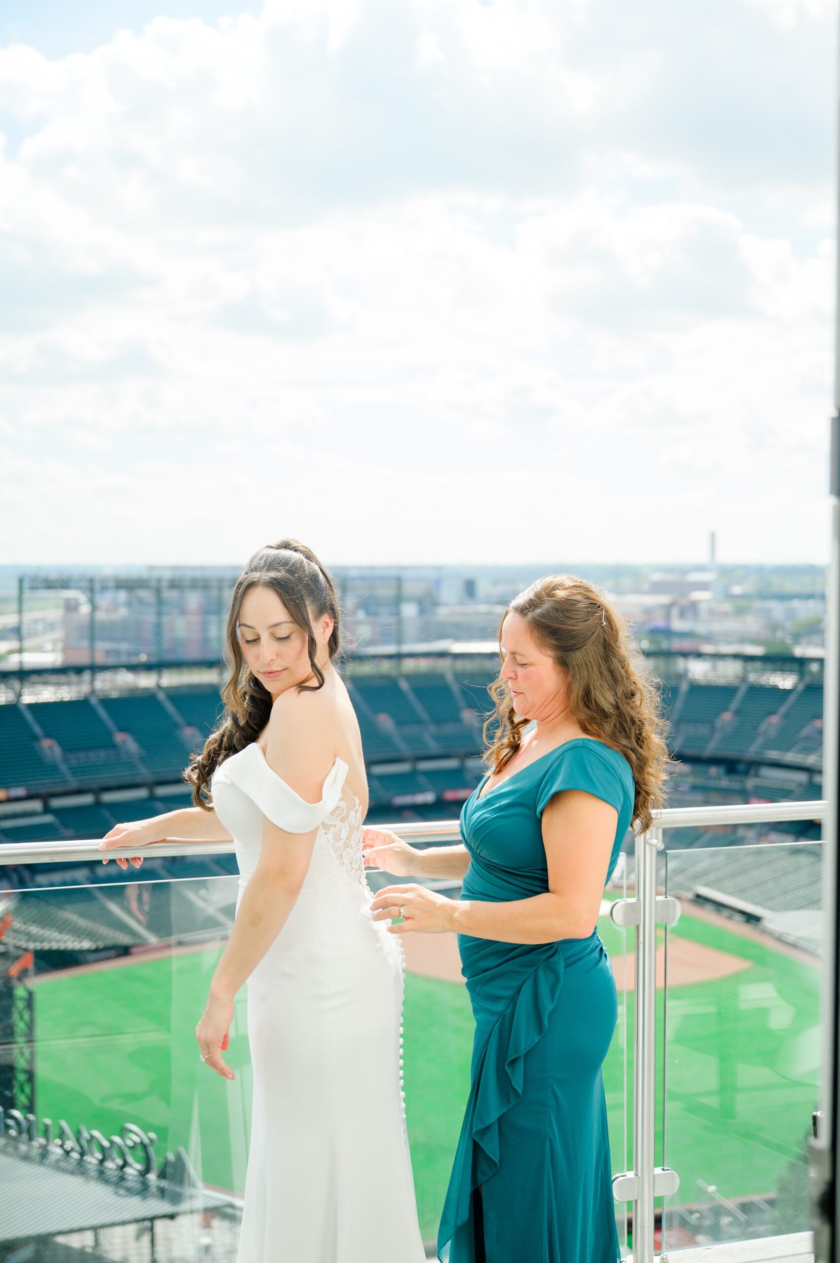 Bride getting ready at Oriole Park at Camden Yards Wedding photographed by Baltimore Wedding Photographer Cait Kramer.