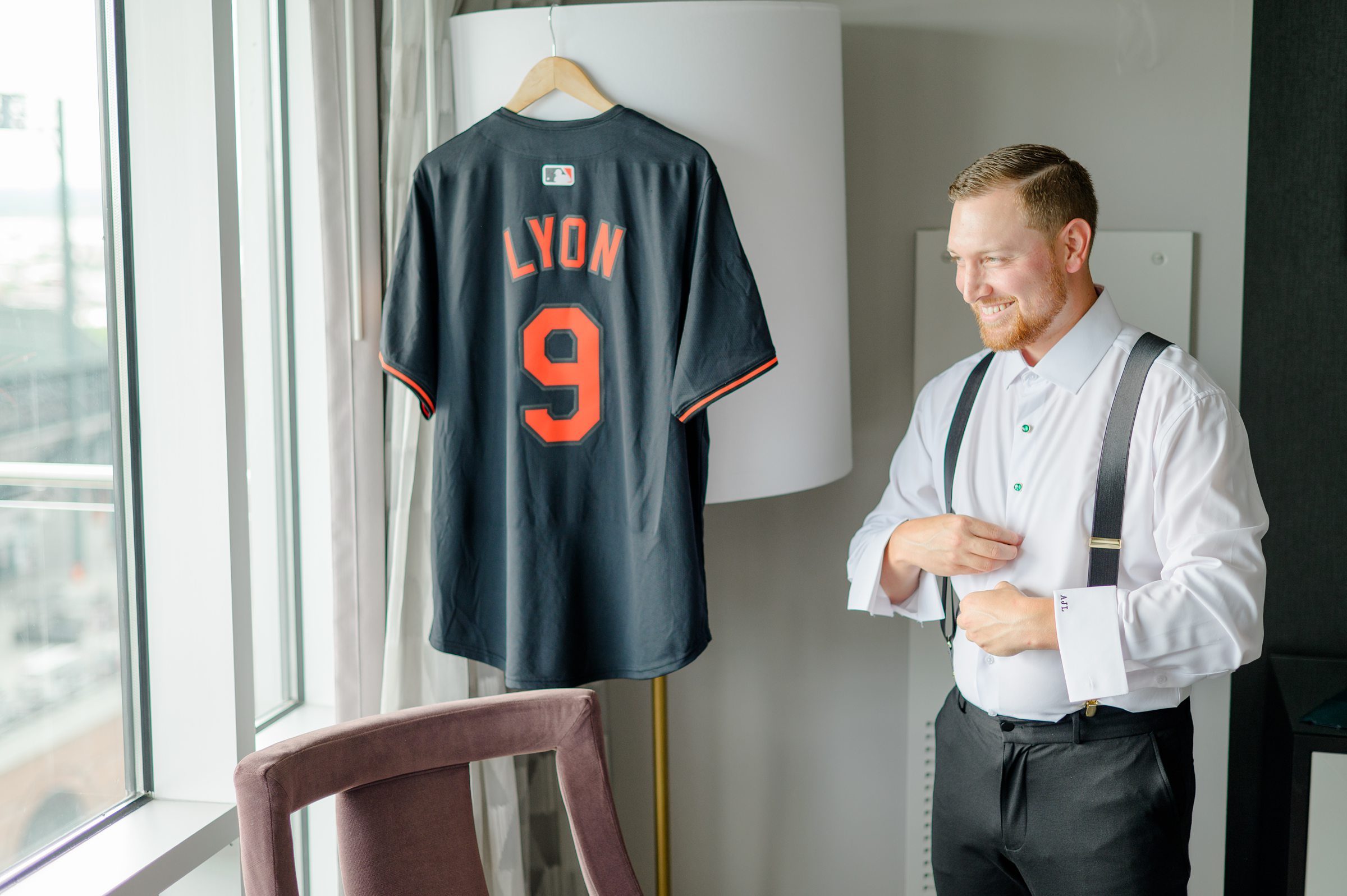 Groom getting ready at Oriole Park at Camden Yards Wedding photographed by Baltimore Wedding Photographer Cait Kramer.