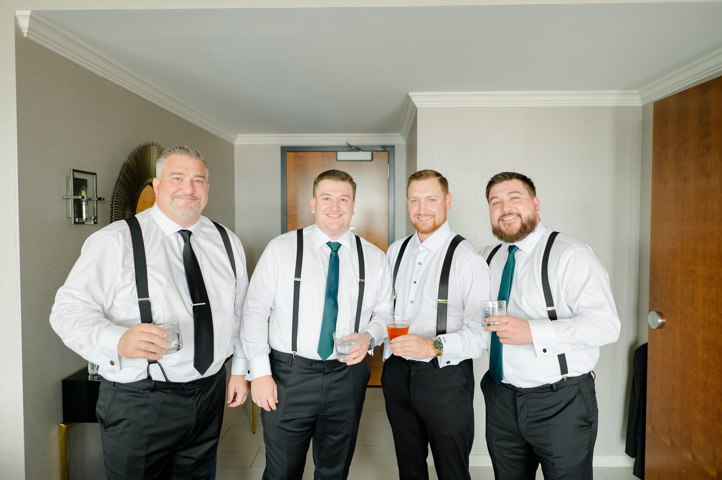 Groom getting ready at Oriole Park at Camden Yards Wedding photographed by Baltimore Wedding Photographer Cait Kramer.