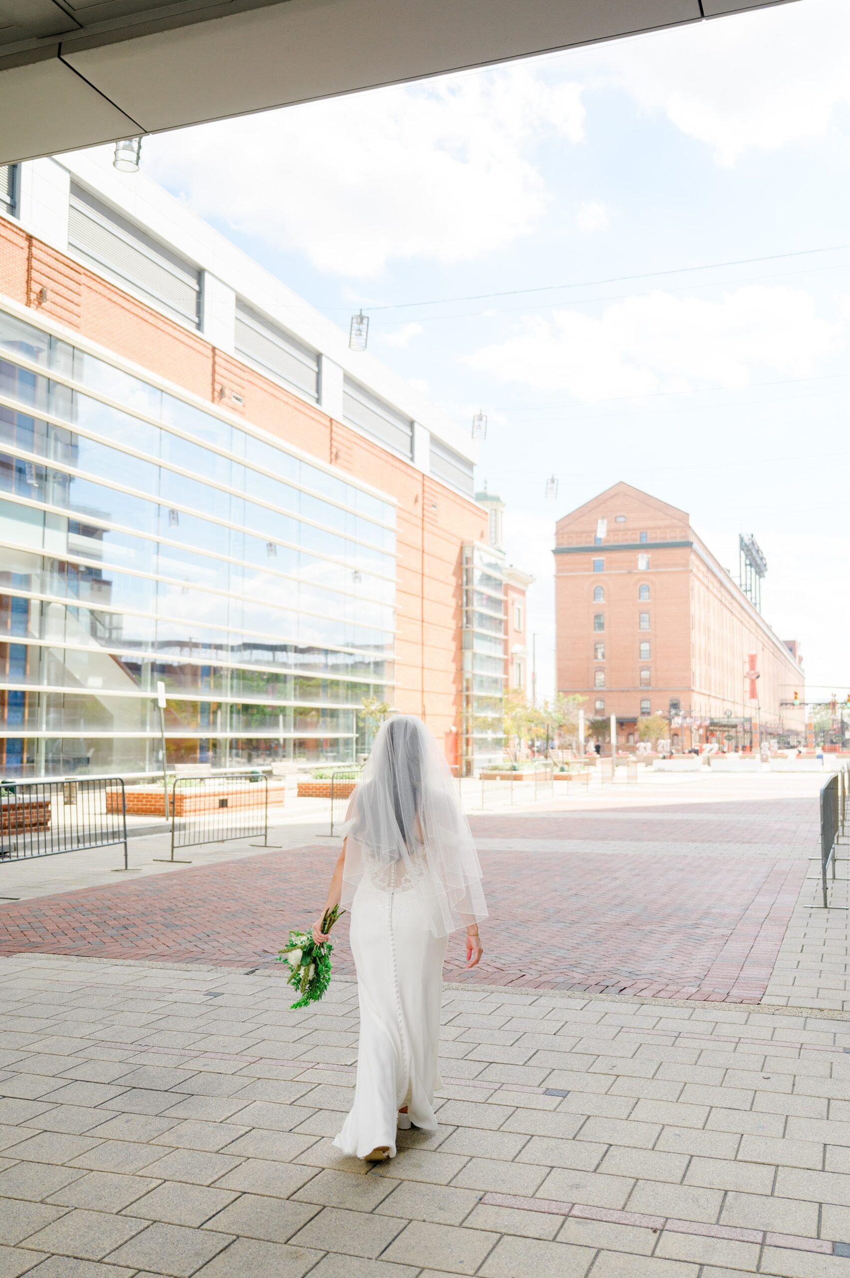 Bride and Groom first look at Oriole Park at Camden Yards Wedding photographed by Baltimore Wedding Photographer Cait Kramer.