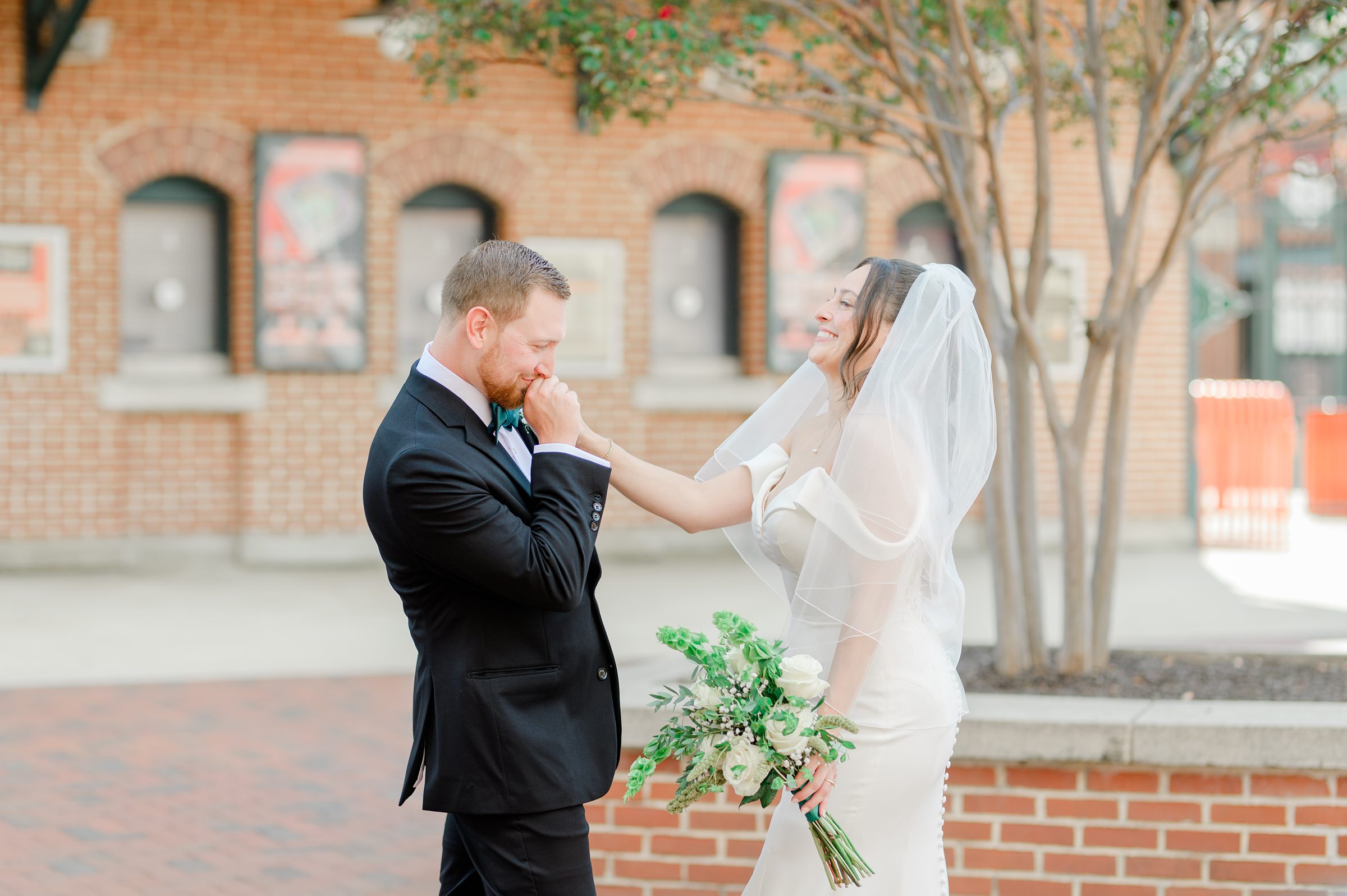 Bride and Groom first look at Oriole Park at Camden Yards Wedding photographed by Baltimore Wedding Photographer Cait Kramer.