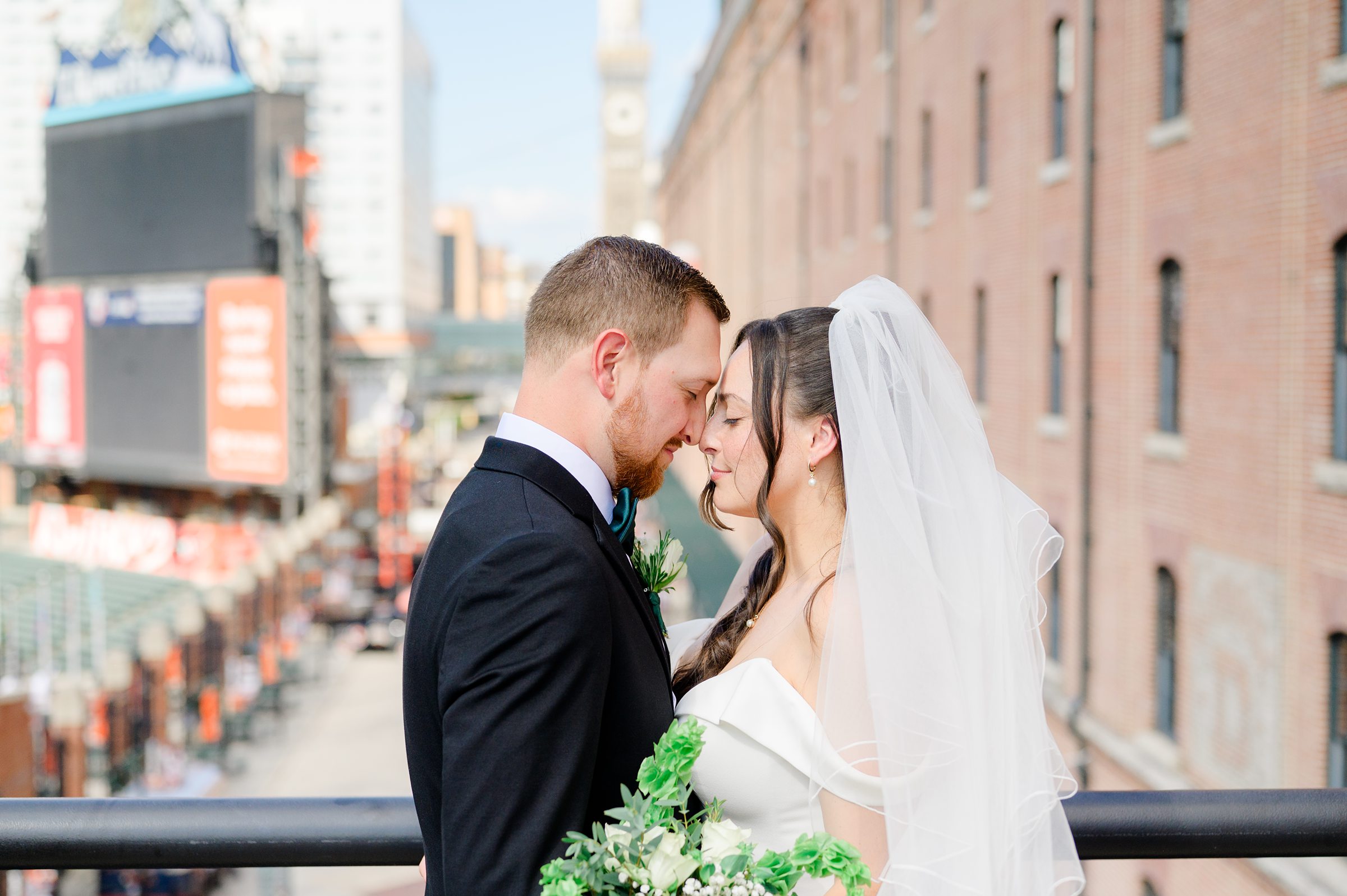 Bride and Groom portraits at Oriole Park at Camden Yards Wedding photographed by Baltimore Wedding Photographer Cait Kramer.