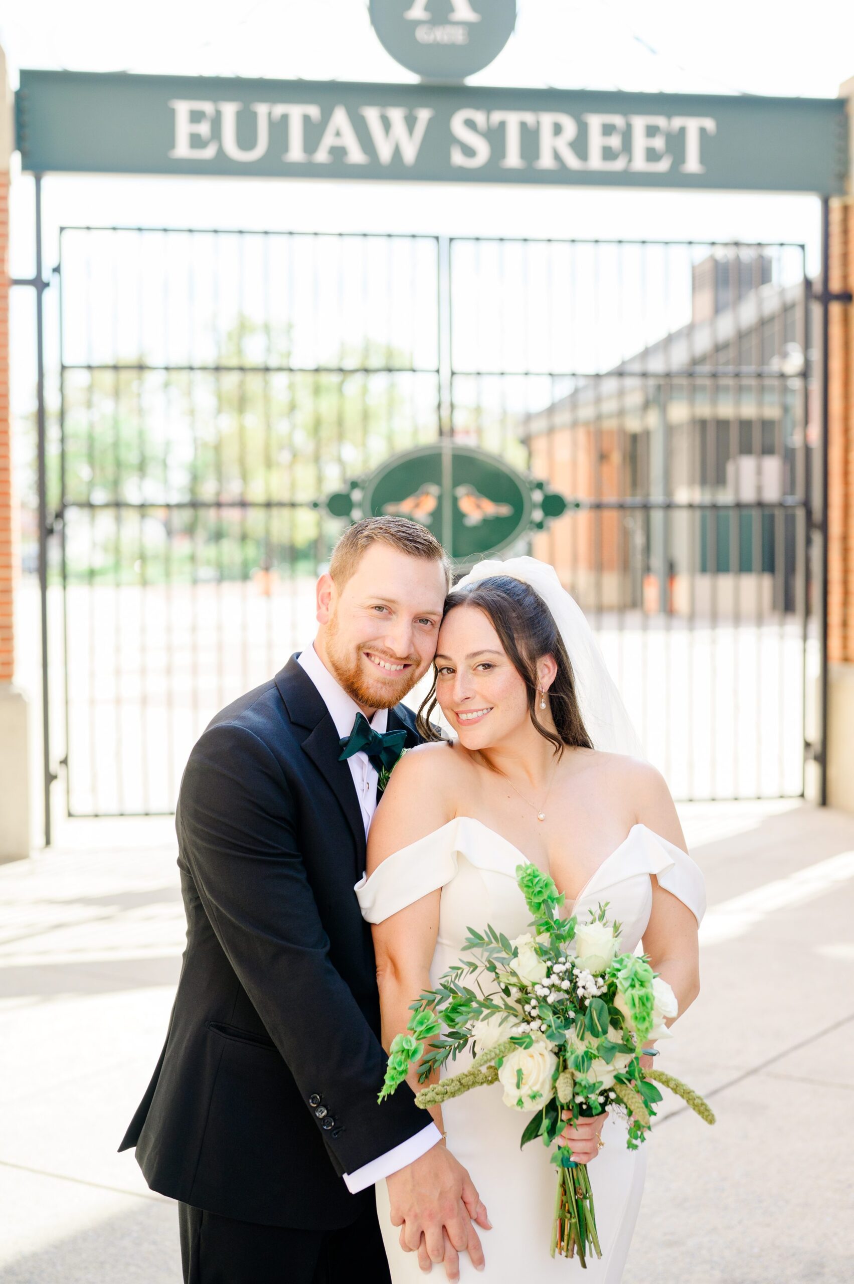 Bride and Groom portraits at Oriole Park at Camden Yards Wedding photographed by Baltimore Wedding Photographer Cait Kramer.