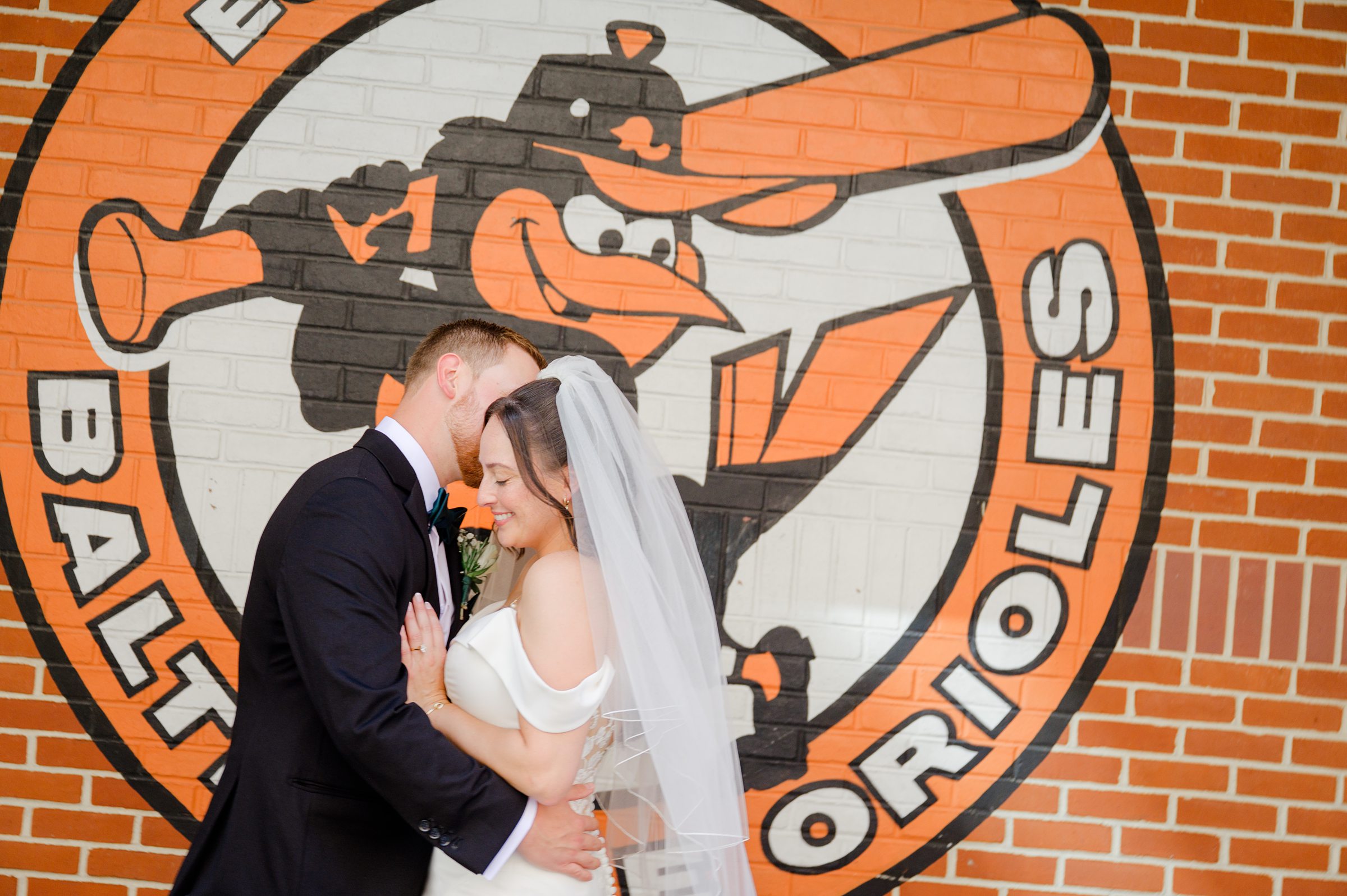Bride and Groom portraits at Oriole Park at Camden Yards Wedding photographed by Baltimore Wedding Photographer Cait Kramer.