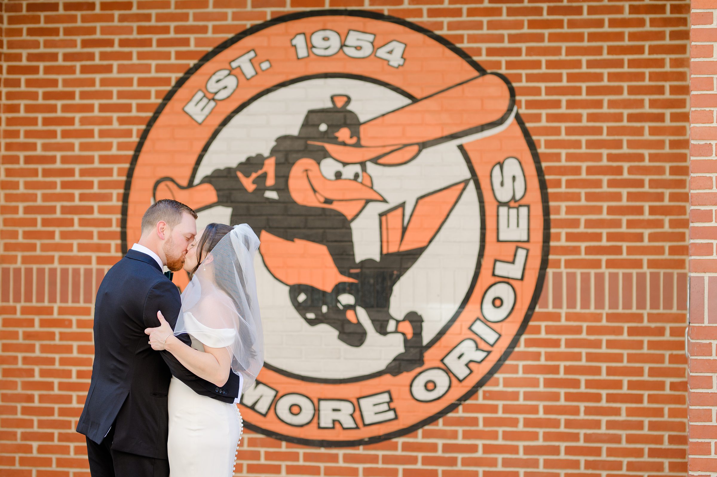 Bride and Groom portraits at Oriole Park at Camden Yards Wedding photographed by Baltimore Wedding Photographer Cait Kramer.