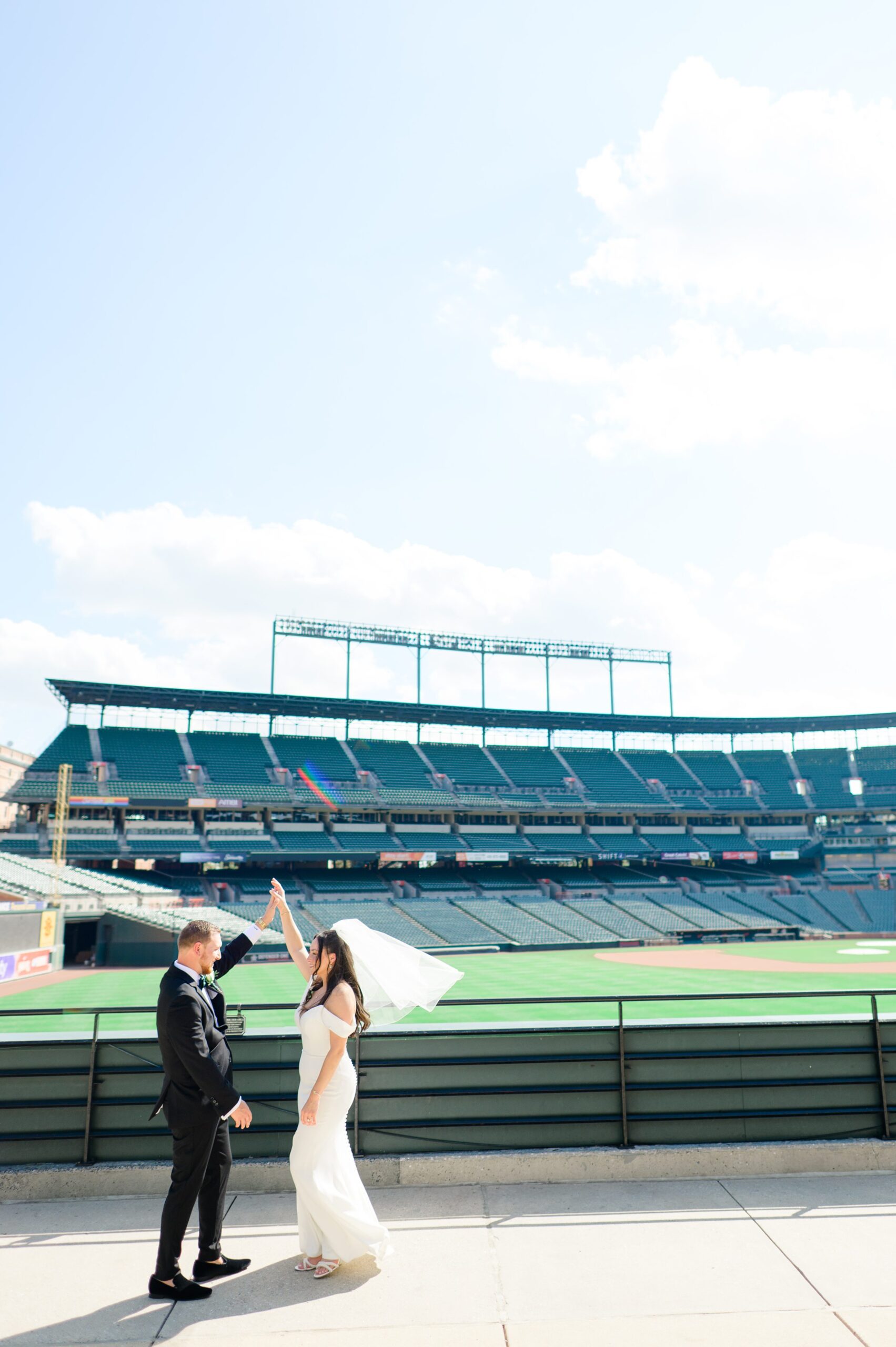 Bride and Groom portraits at Oriole Park at Camden Yards Wedding photographed by Baltimore Wedding Photographer Cait Kramer.