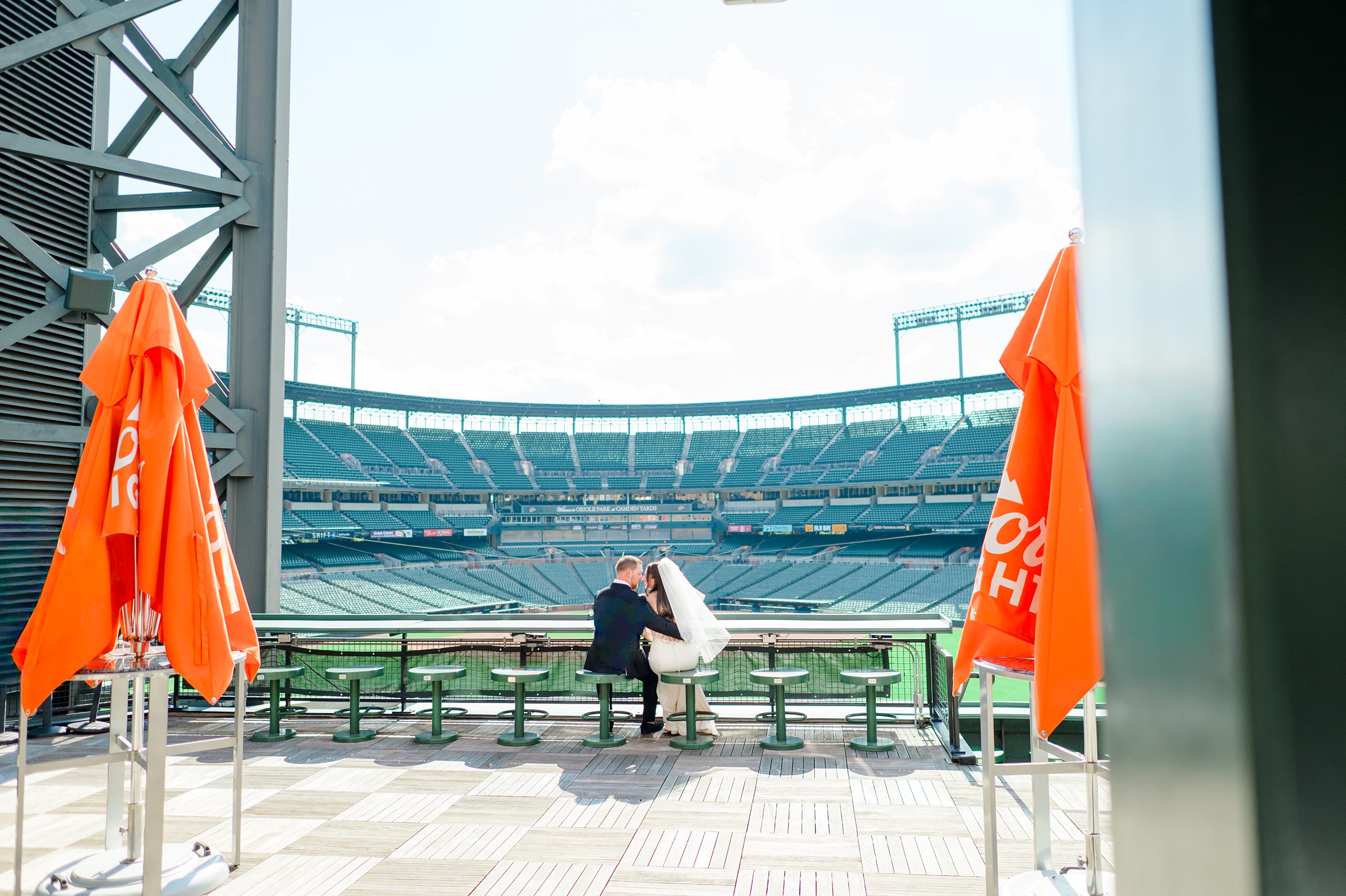 Bride and Groom portraits at Oriole Park at Camden Yards Wedding photographed by Baltimore Wedding Photographer Cait Kramer.