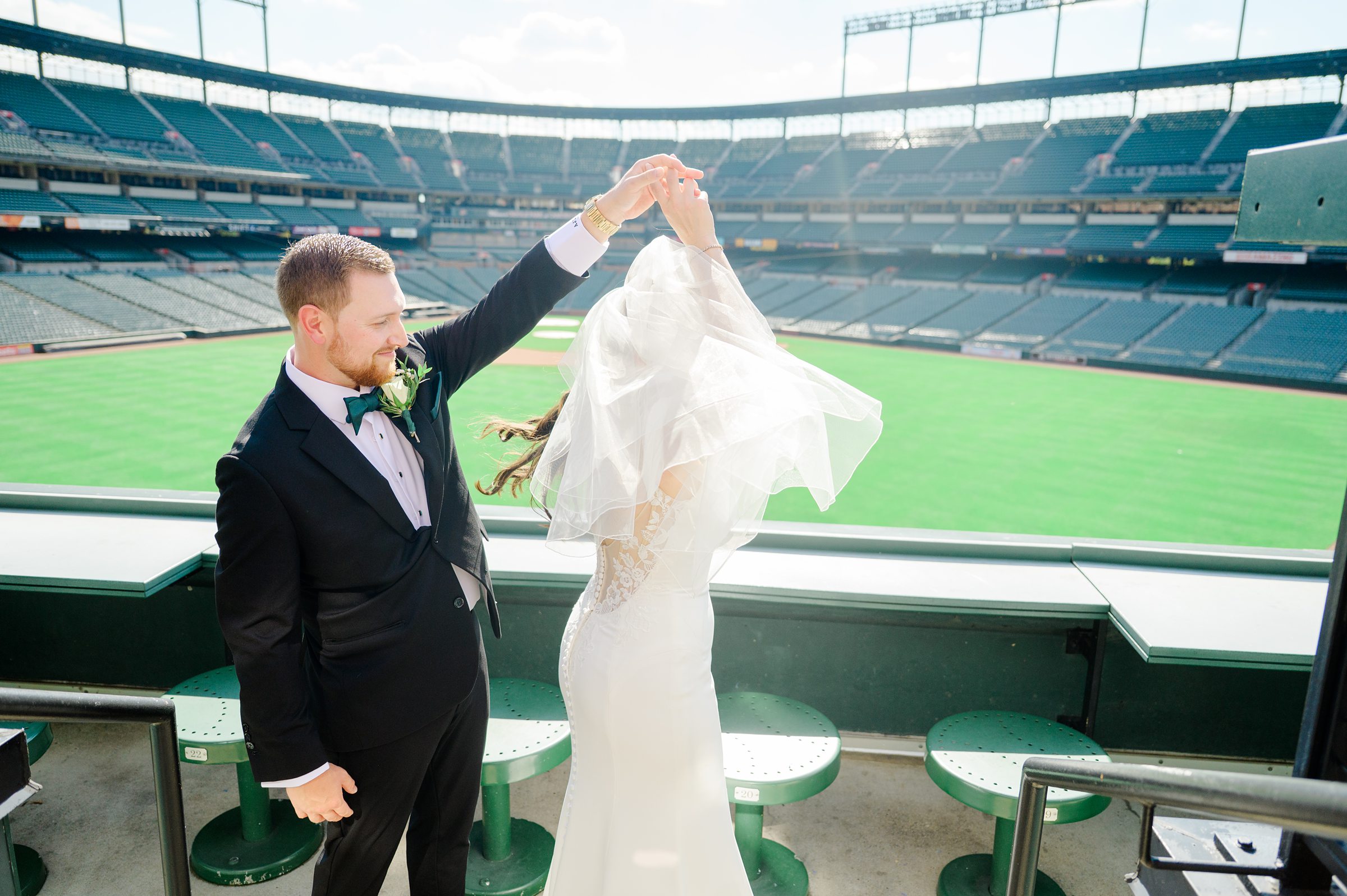 Bride and Groom portraits at Oriole Park at Camden Yards Wedding photographed by Baltimore Wedding Photographer Cait Kramer.