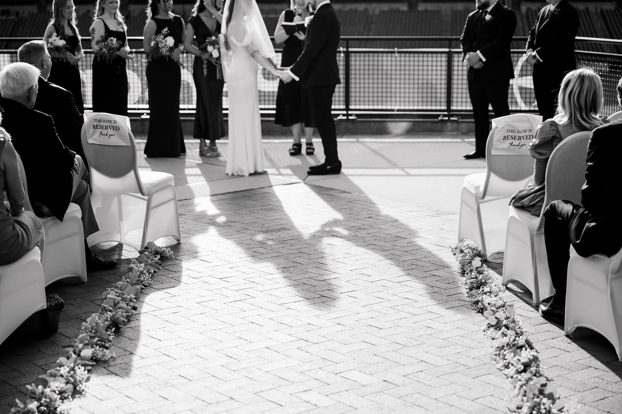 Wedding Ceremony at Oriole Park at Camden Yards photographed by Baltimore Wedding Photographer Cait Kramer.