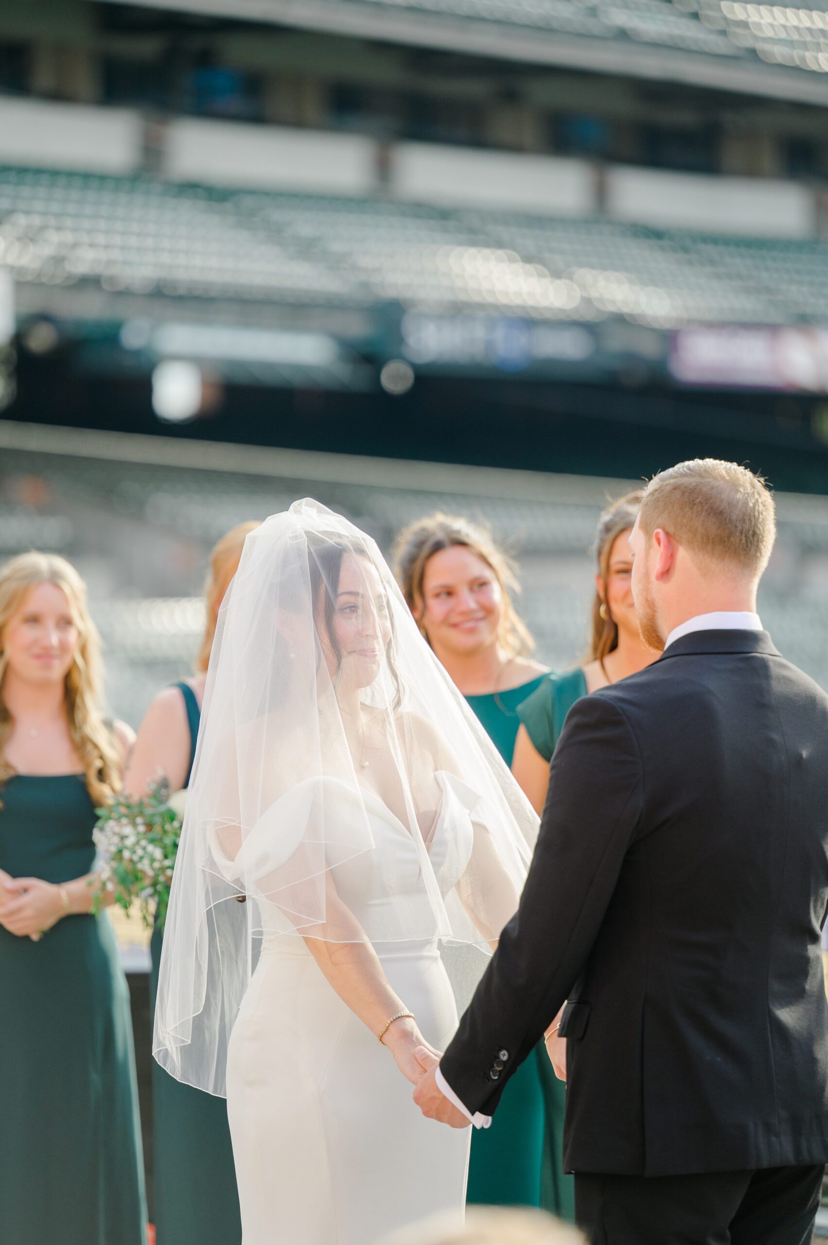 Wedding Ceremony at Oriole Park at Camden Yards photographed by Baltimore Wedding Photographer Cait Kramer.