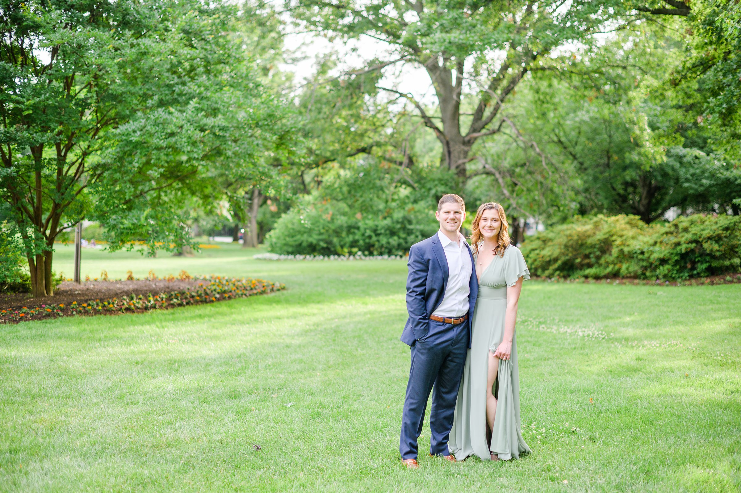 Engaged Couple smiles in Sherwood Gardens engagement session photographed by Maryland Wedding Photographer Cait Kramer Photography