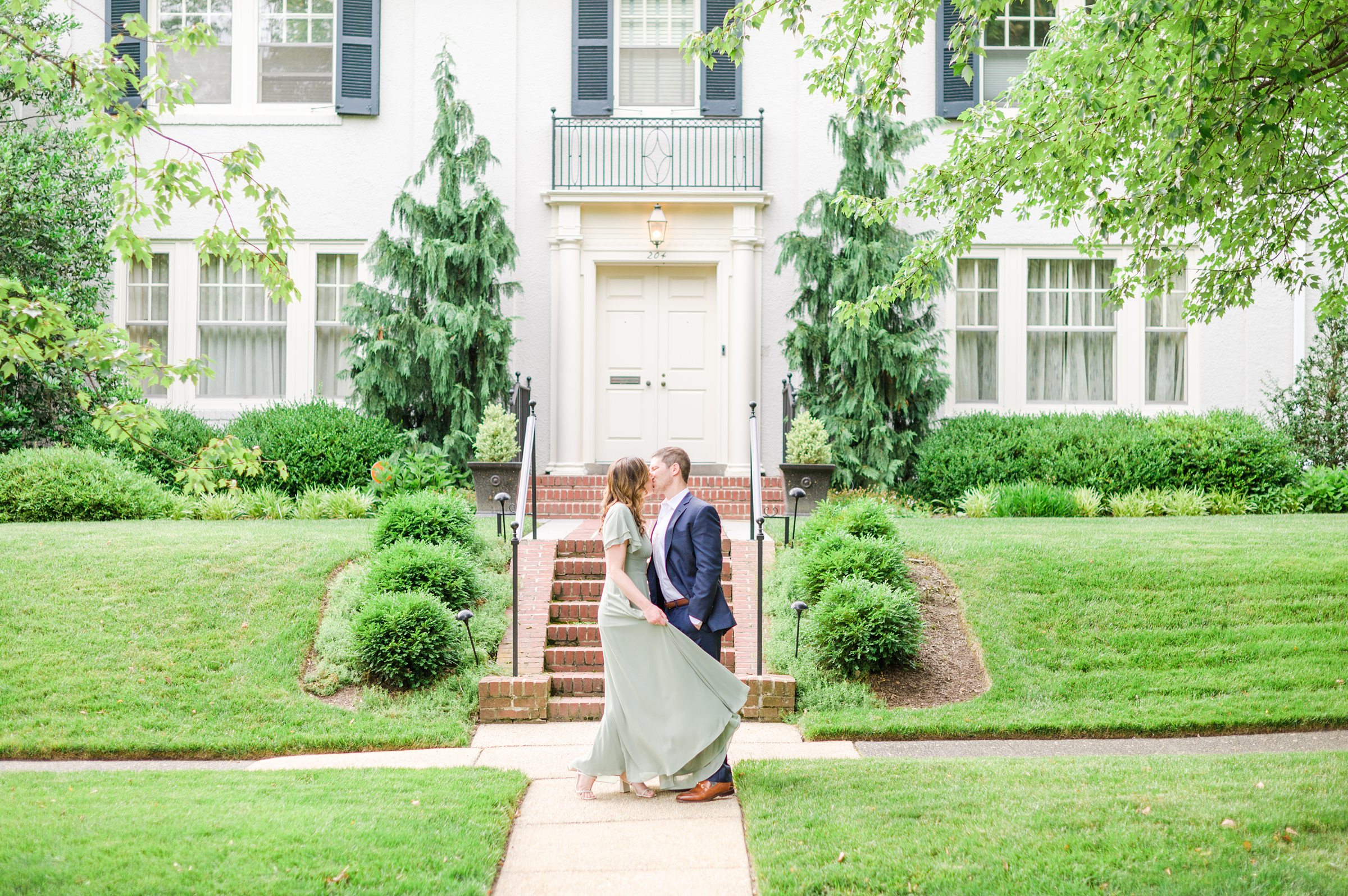 Engaged Couple smiles in Sherwood Gardens engagement session photographed by Maryland Wedding Photographer Cait Kramer Photography