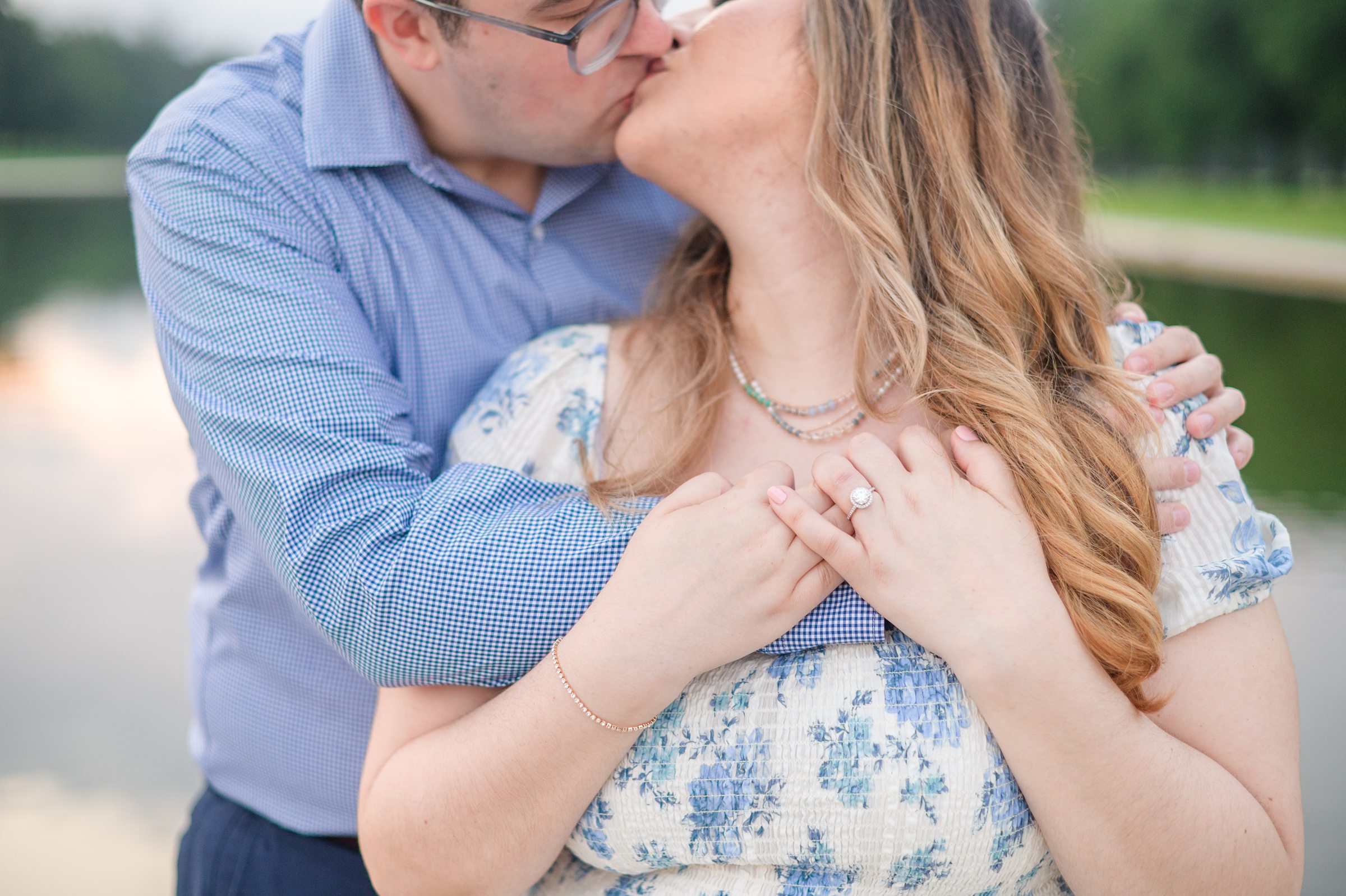 Couple smiles during their engagement photos at the Lincoln Memorial photographed by Baltimore Wedding Photographer, Cait Kramer Photography