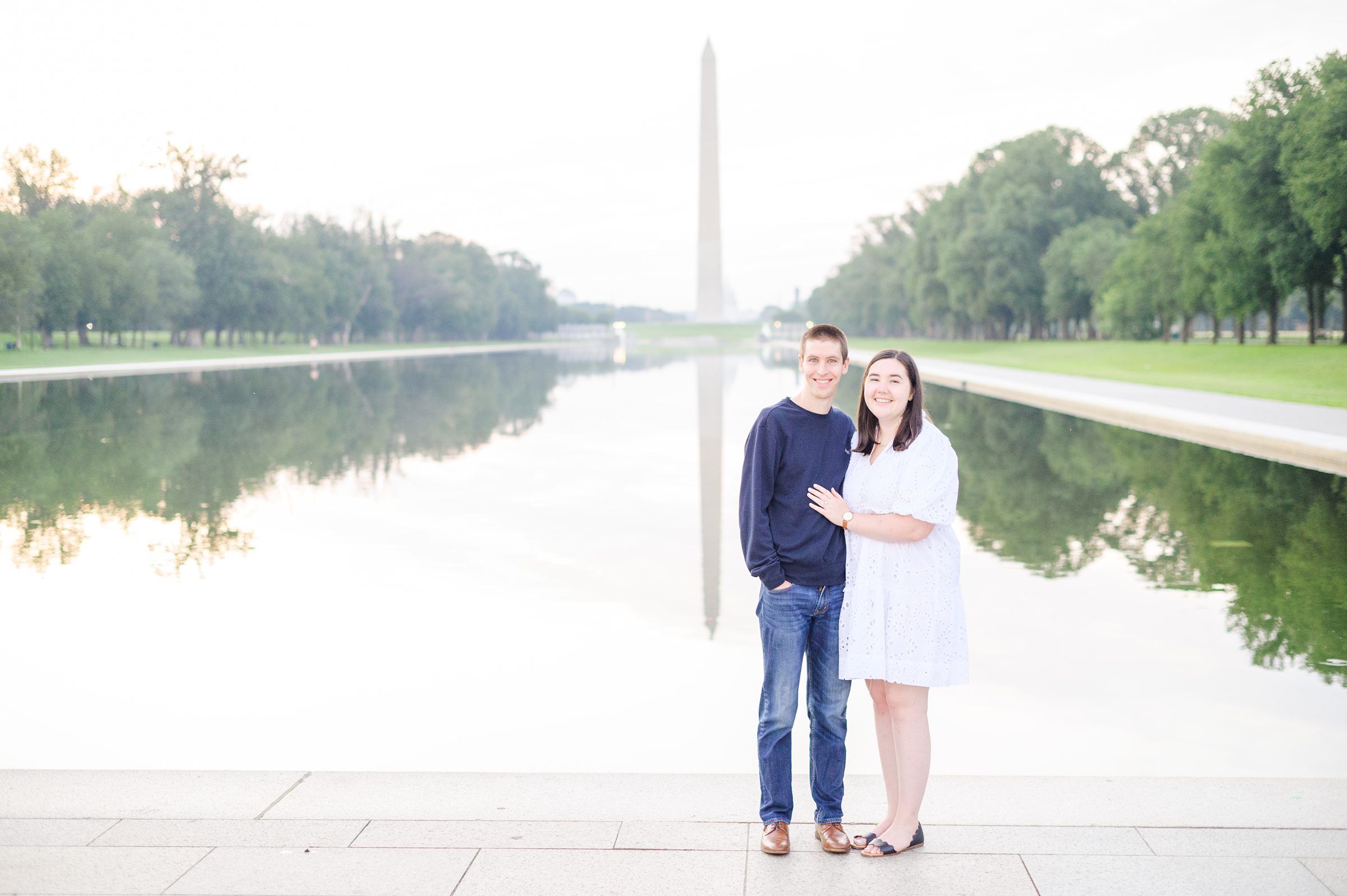 Couple smiles during their Lincoln Memorial engagement photos during session photographed by Baltimore wedding photographer, Cait Kramer