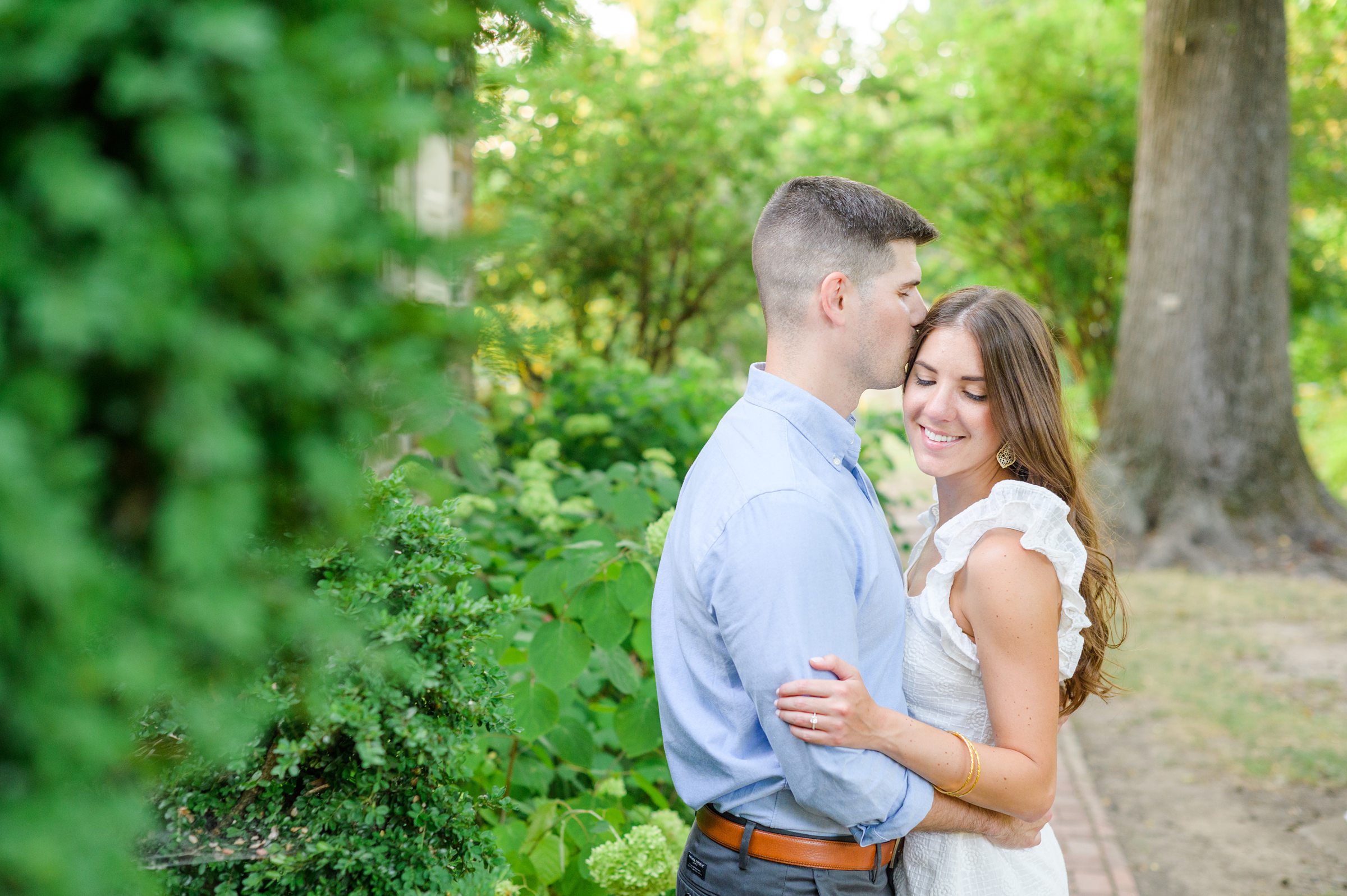 Engaged couple at a local park for their summer engagement session at Fort Hunter Mansion and Park in Harrisburg, Pennsylvania photographed by Baltimore Wedding Photographer Cait Kramer Photography