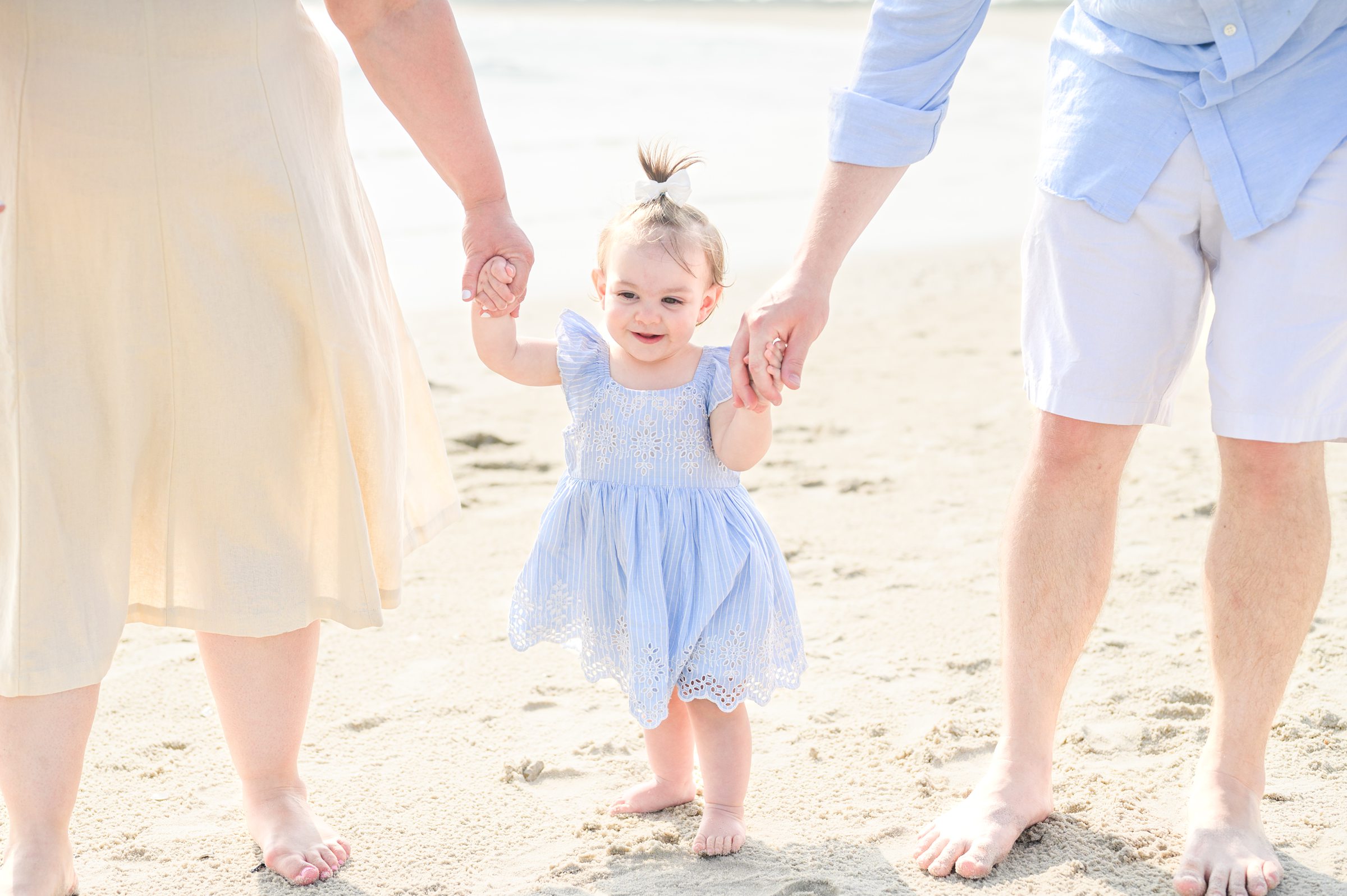 Extended family portraits at Cape May's Cove beach in Maryland, photographed by Cape May Family Photographer Cait Kramer.