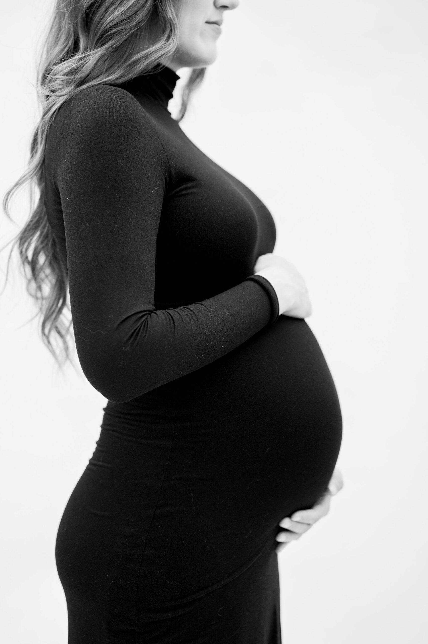 Studio-inspired maternity photos taken in Baltimore, Maryland, photographed by Baltimore Newborn Photographer Cait Kramer Photography.