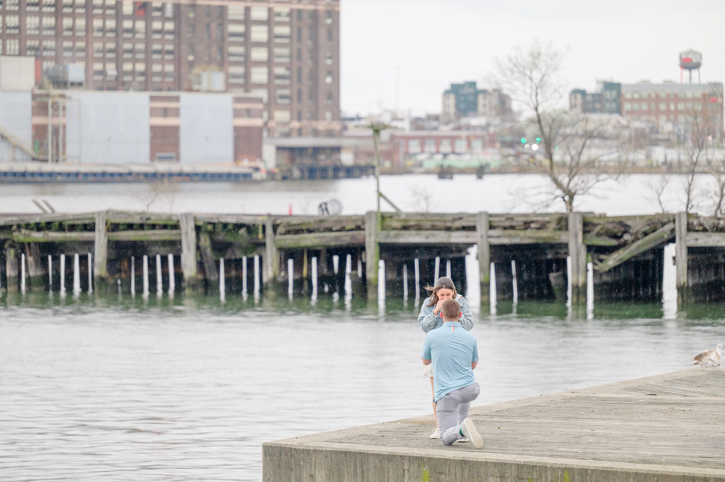 Pat and Nicole’s surprise proposal in Fells Point photographed by Maryland Wedding Photographer Cait Kramer.